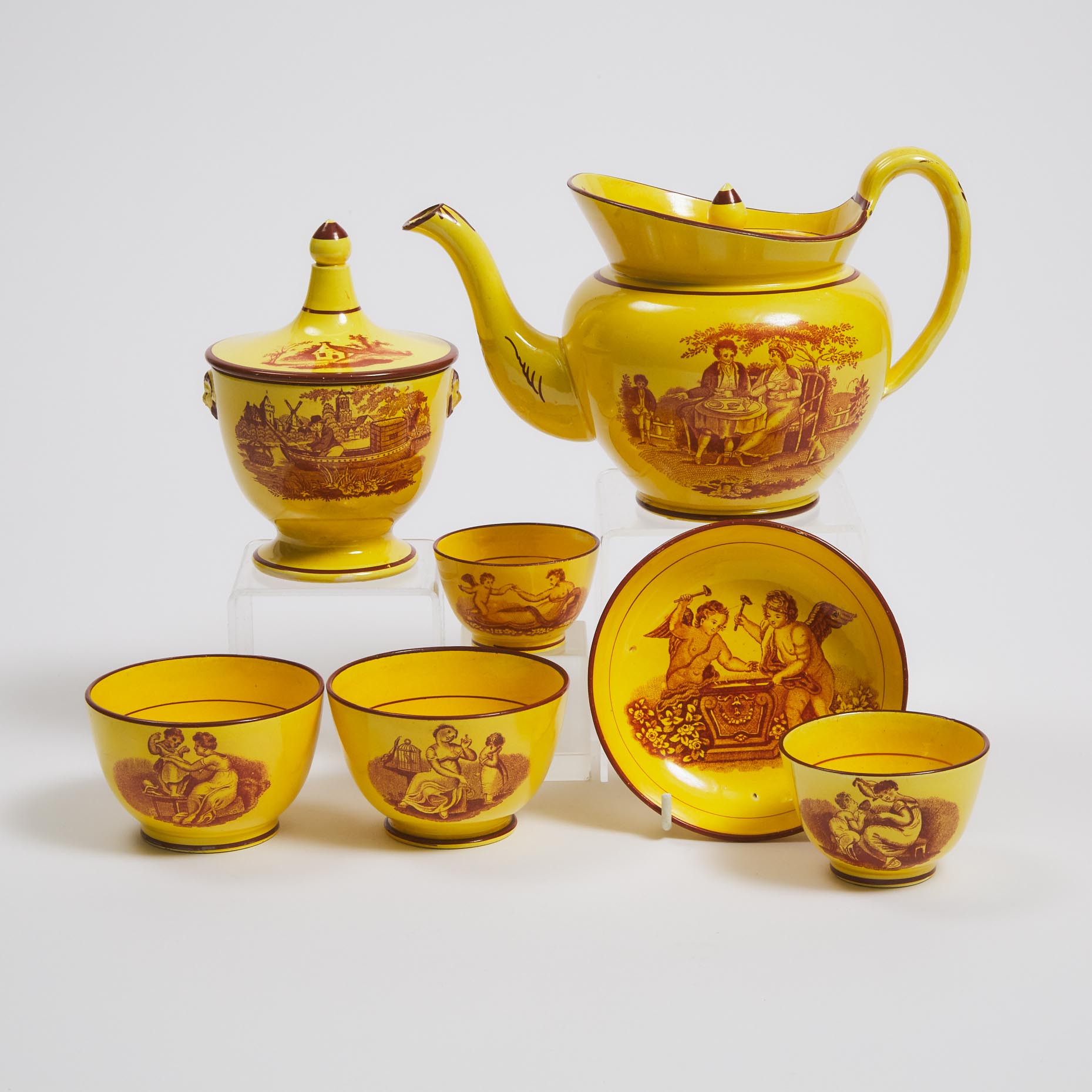 Group of English Red Printed Yellow Ground Earthenware Teawares, c.1810-30