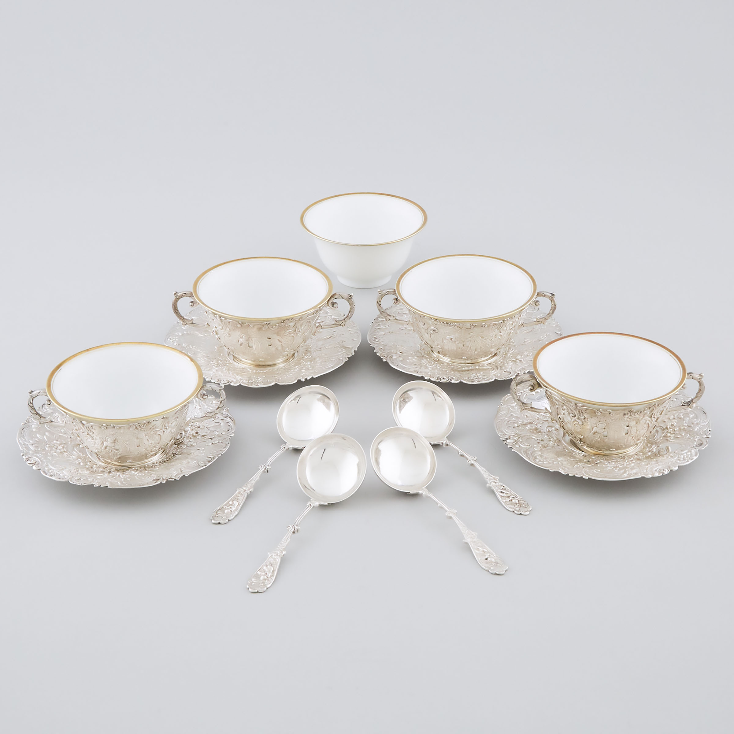 Four German Silver Two-Handled Soup Cups with Stands and Spoons, possibly Wolf & Knell, Hanau, early 20th century