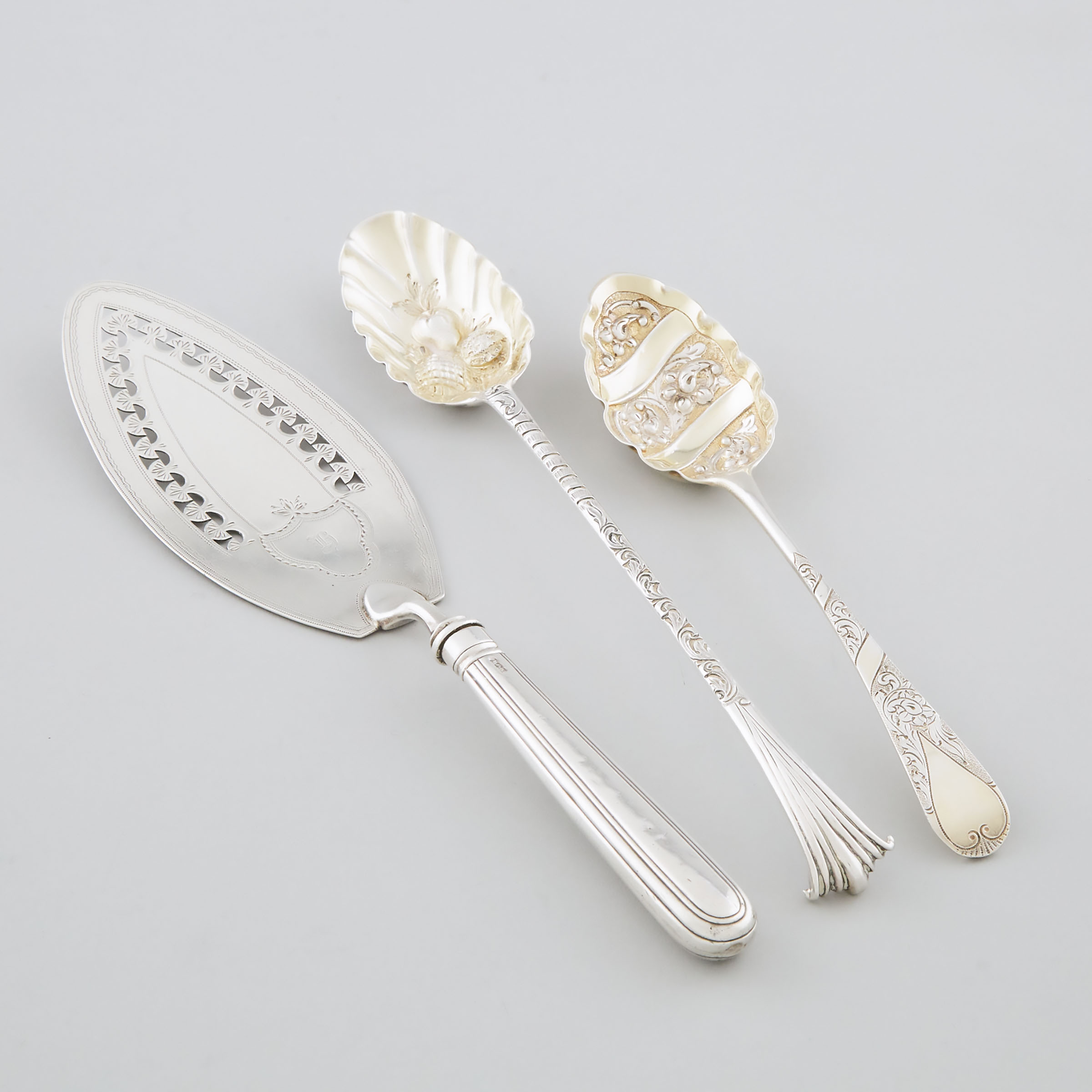 George III Silver Fish Slice and Two Berry Spoons, London, 1764-99