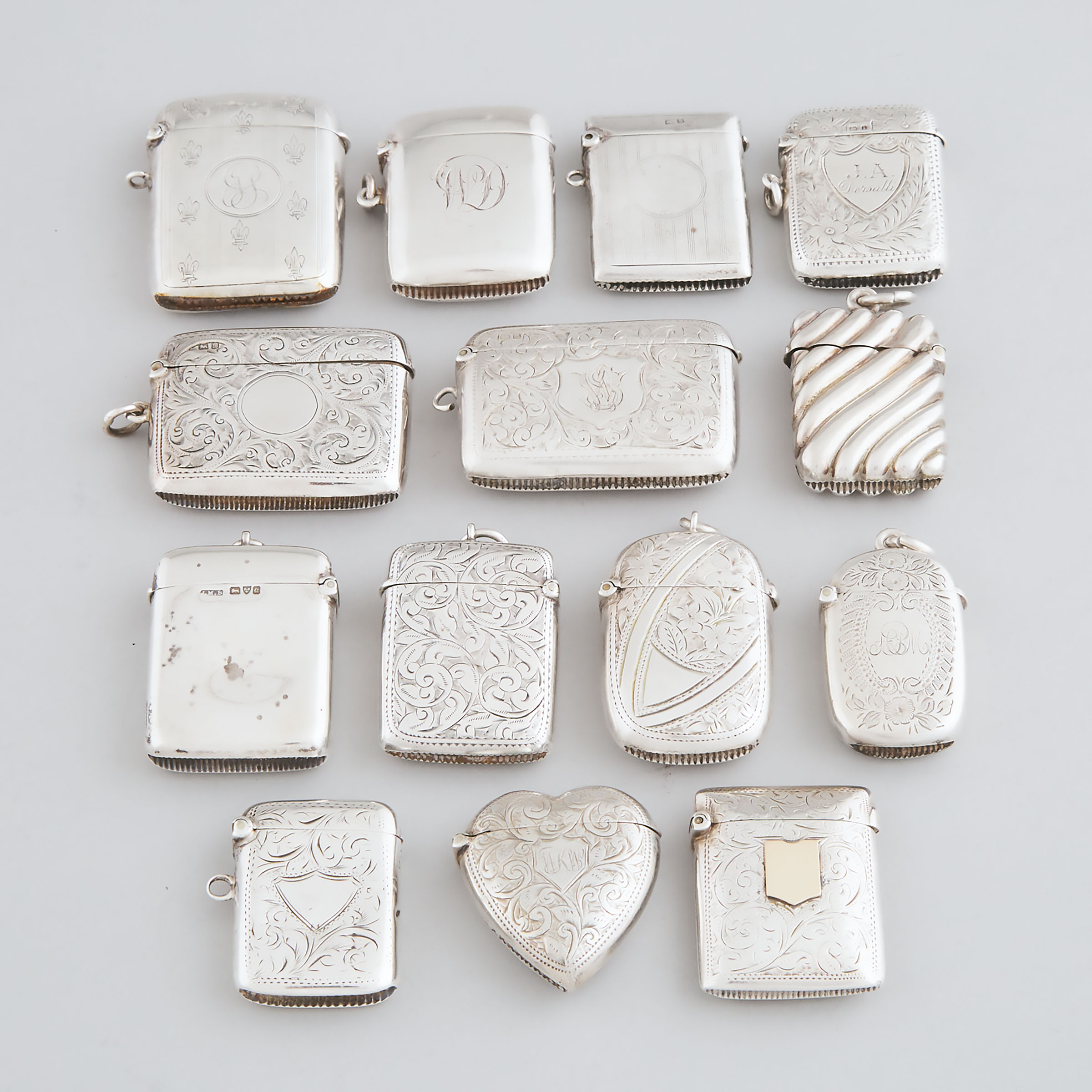 Fourteen Late Victorian, Edwardian and Later Silver Vesta Cases, Birmingham, Chester and Sheffield, c.1888-1917