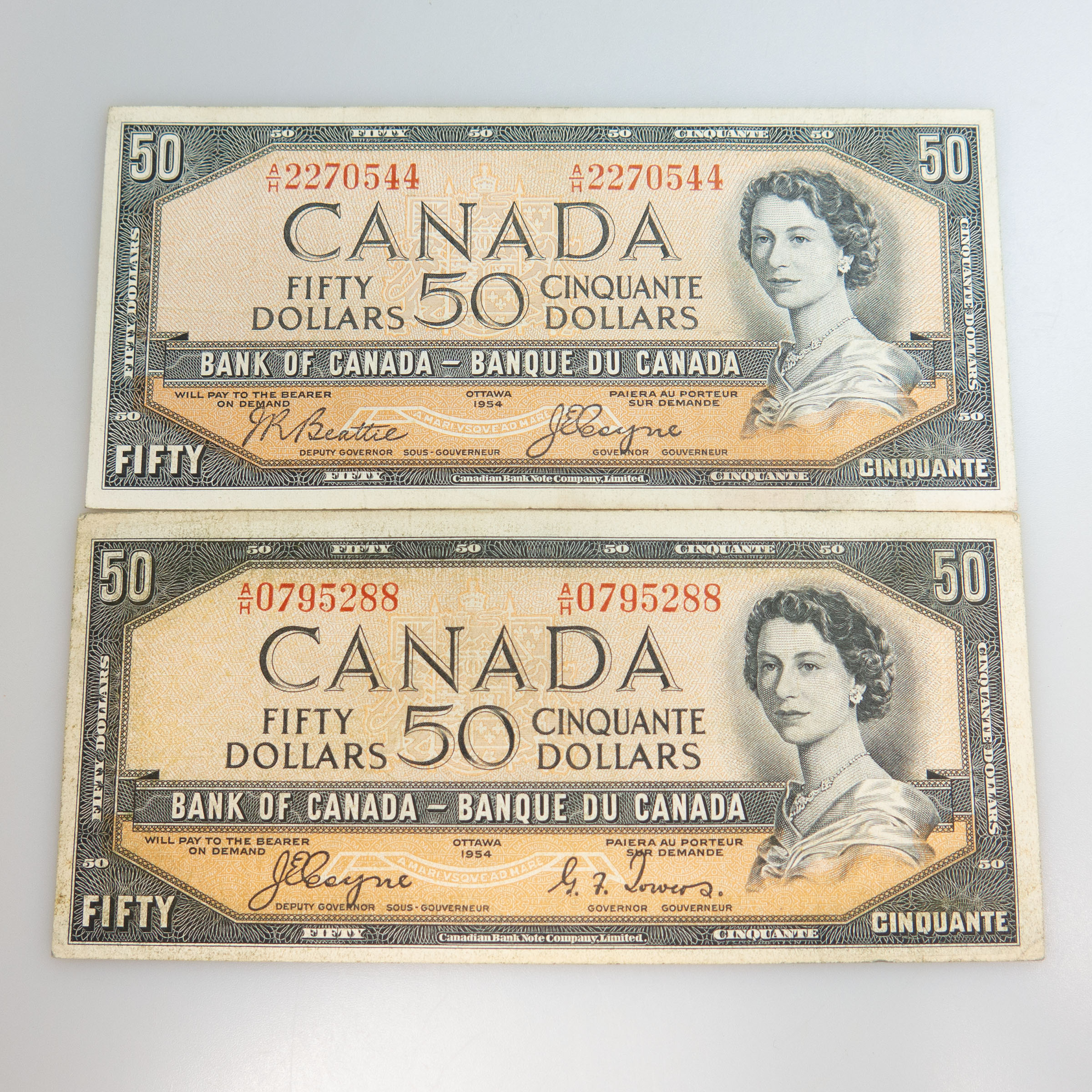 Two Canadian 1954 'Devil's Face' $50 Bank Notes