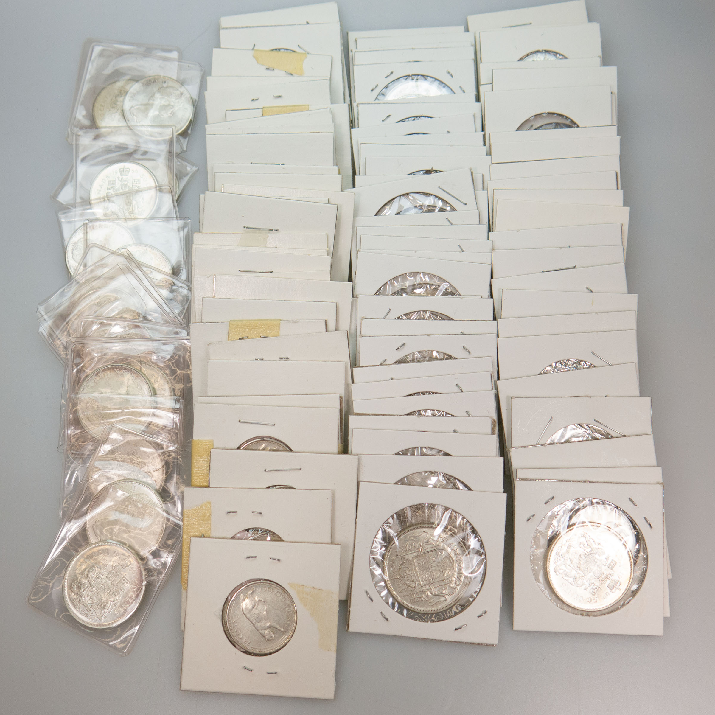 Quantity Of Canadian Silver Quarters And Half Dollars