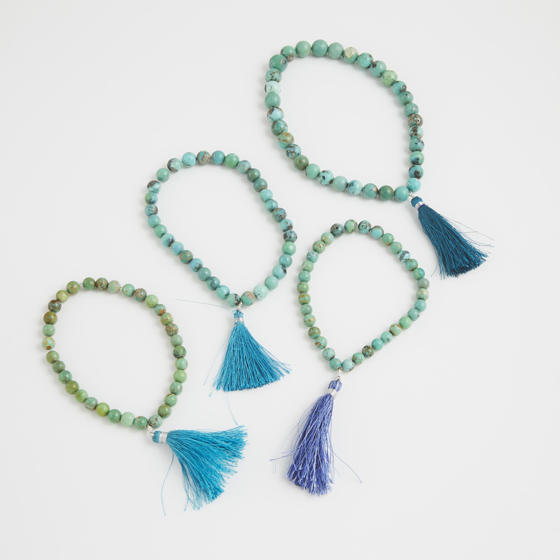 4 Strands Of Turquoise Beads