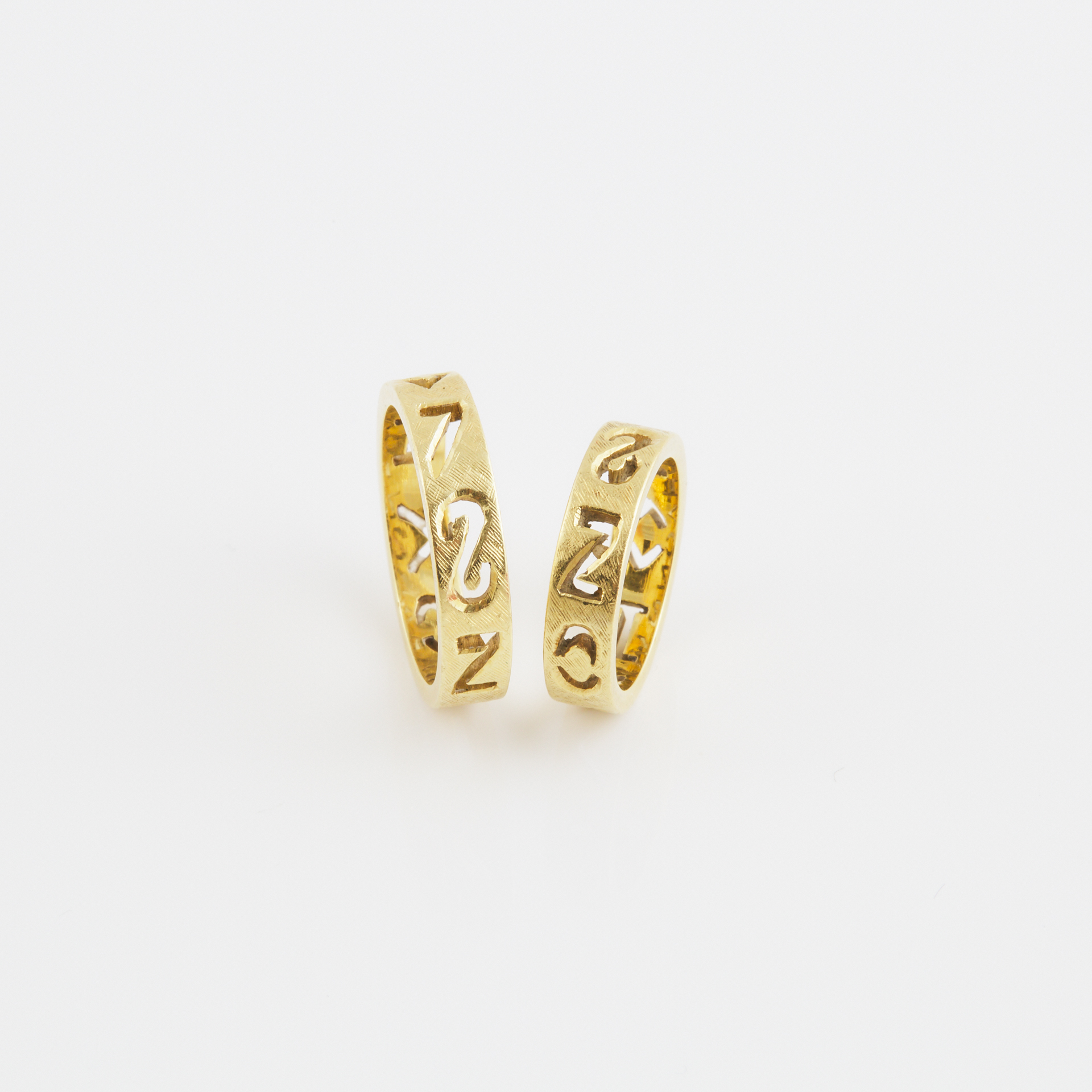 Pair Of 18k Yellow Gold His 'n Hers Bands