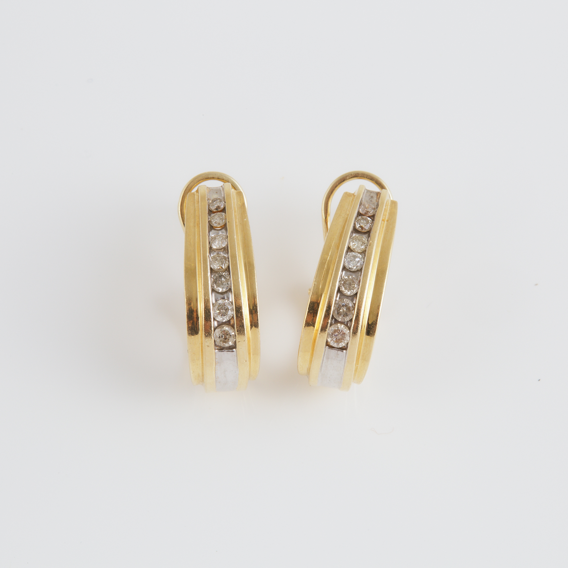 Pair Of 14k Yellow And White Gold Half Hoop Earrings