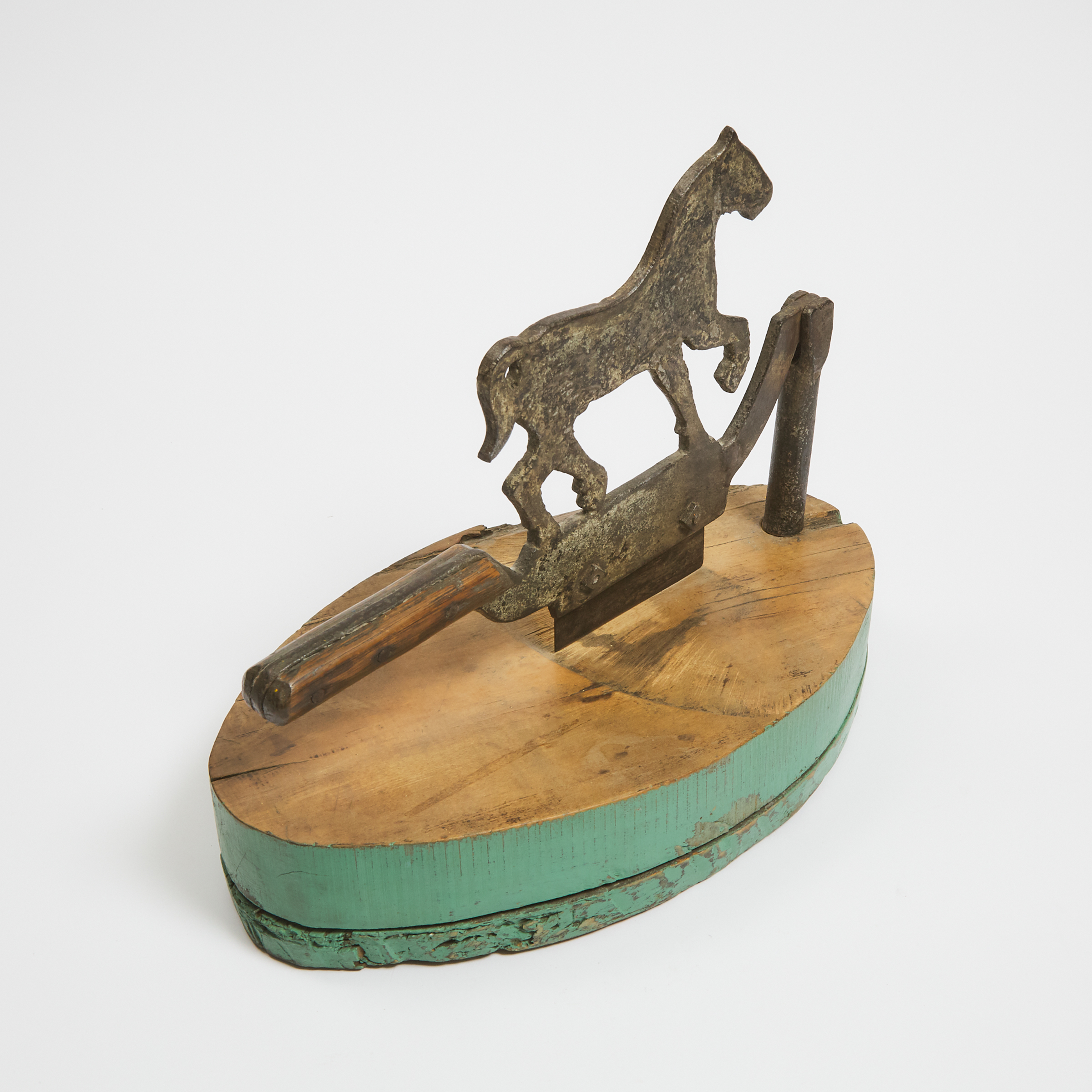 QUEBEC PAINTED IRON AND WOOD HORSE FORM TOBACCO CUTTER, 19th CENTURY