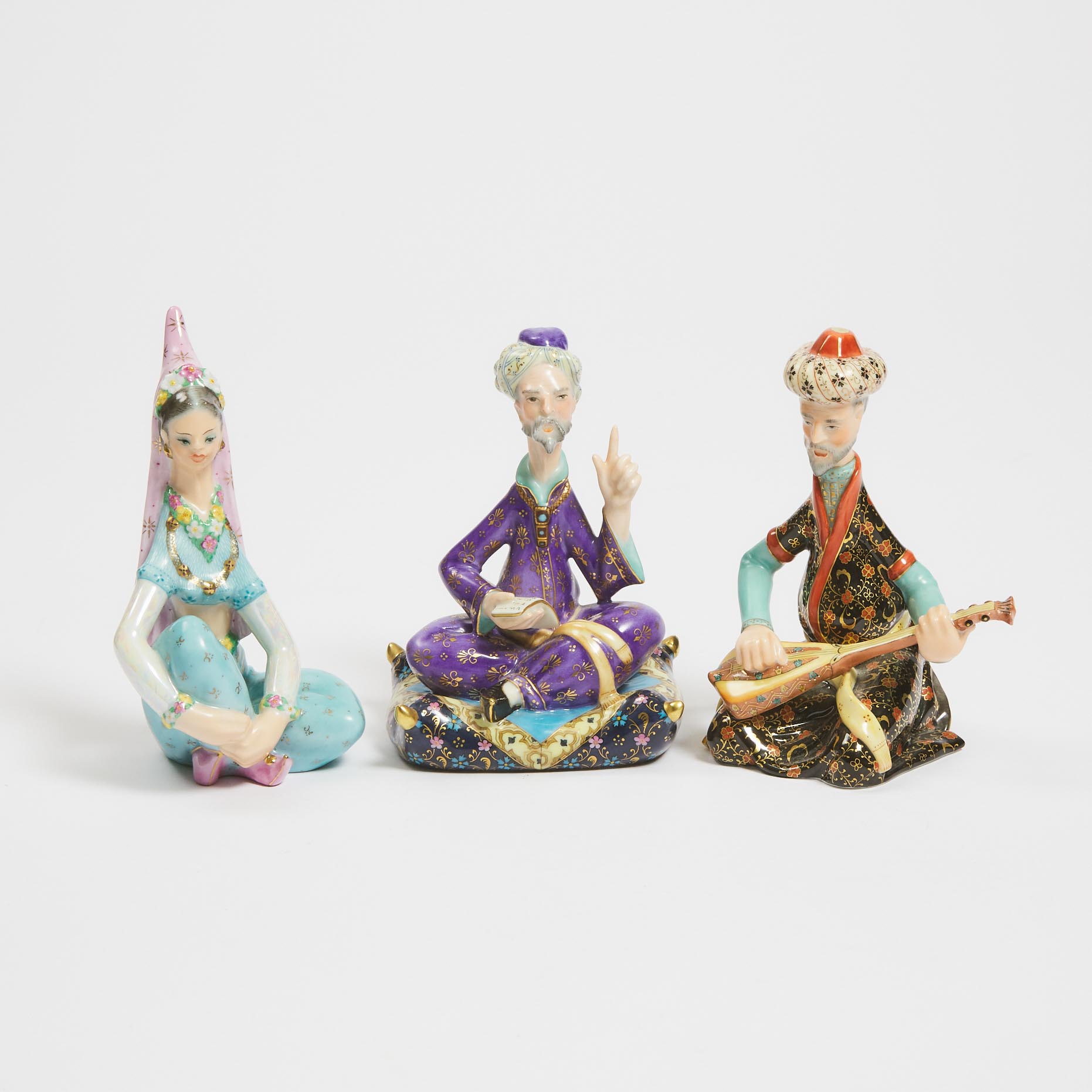 Three Herend Seated Persian Figures, early 21st century