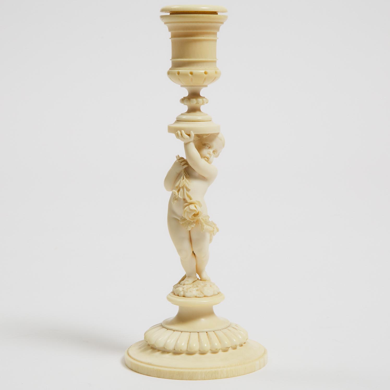 French Figural Carved Ivory Candelstick, late 19th/early 20th century