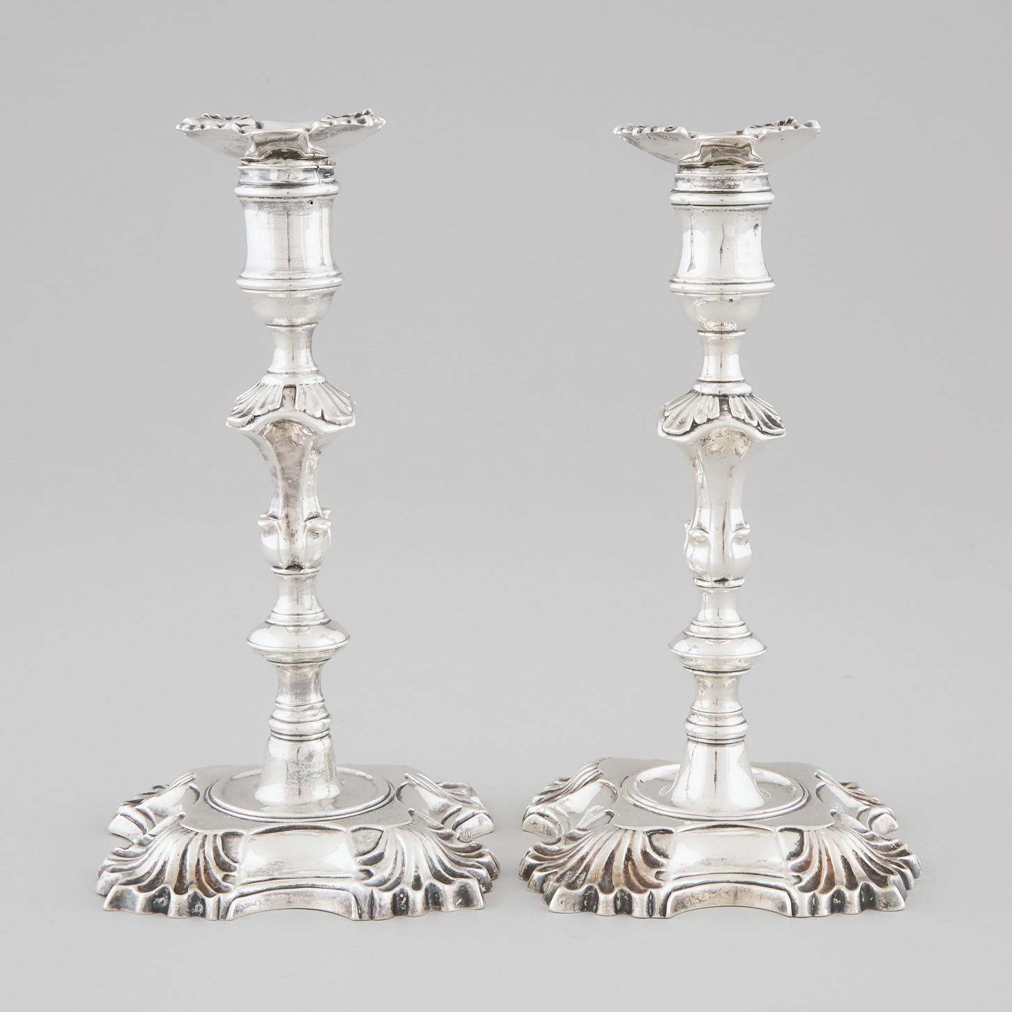 Matching Pair of George II Silver Table Candlesticks, John Cafe and Simon Jouet, London, 1748 and 1752
