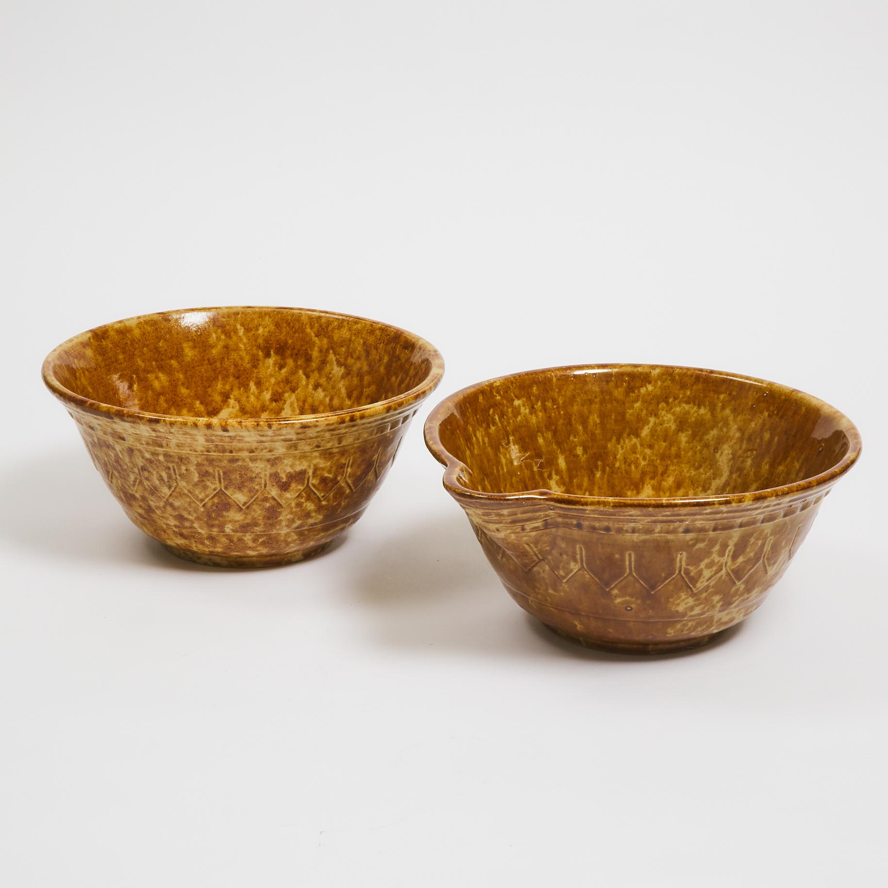 Two Bennington-Type Brown Spatter Glazed Bowls, 19th century