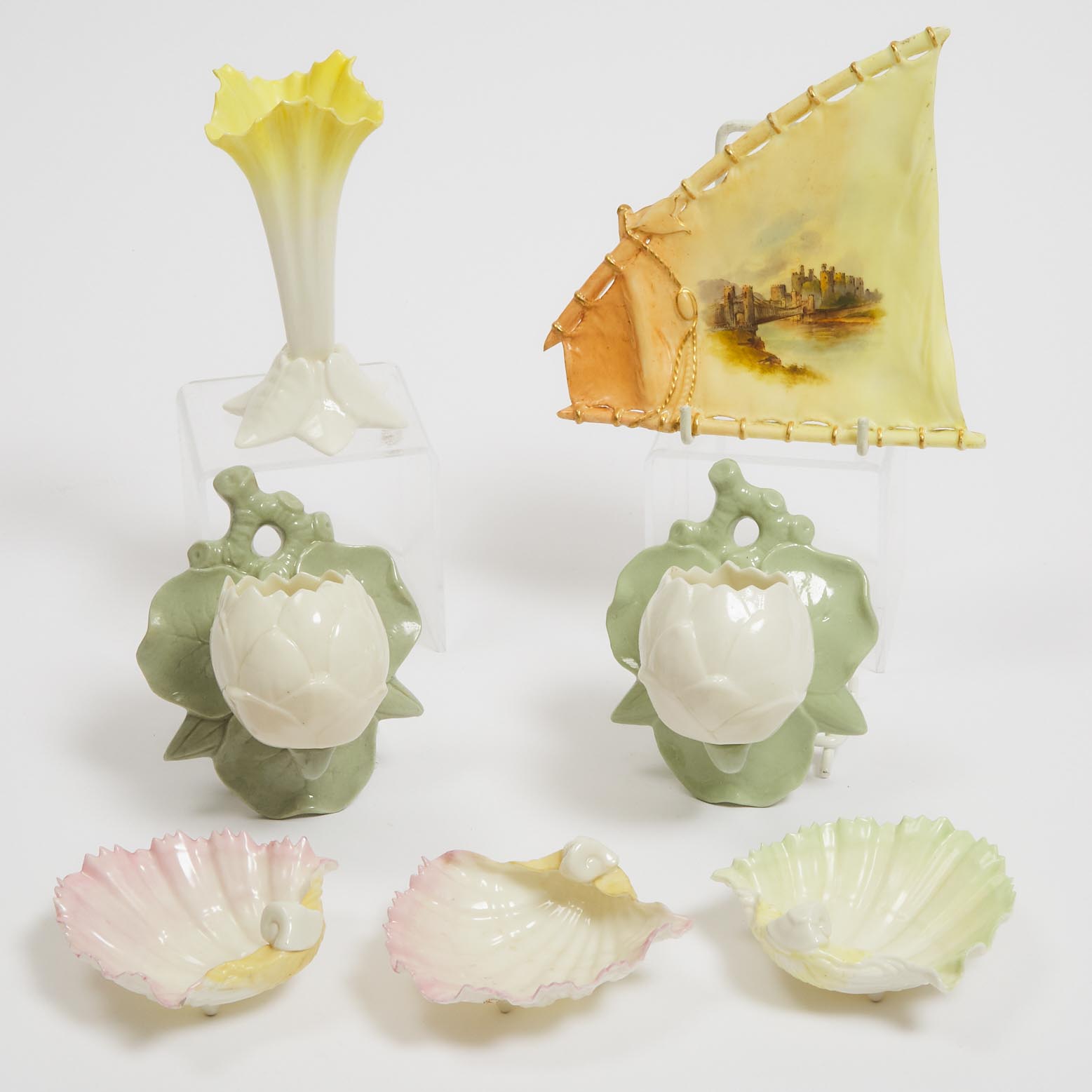 Pair of Grainger & Co. Worcester Moulded Lily Wall Pockets, a Vase, Three Small Shell Dishes and a 'Conway Castle' Sail-Form Dish, c.1885-1902