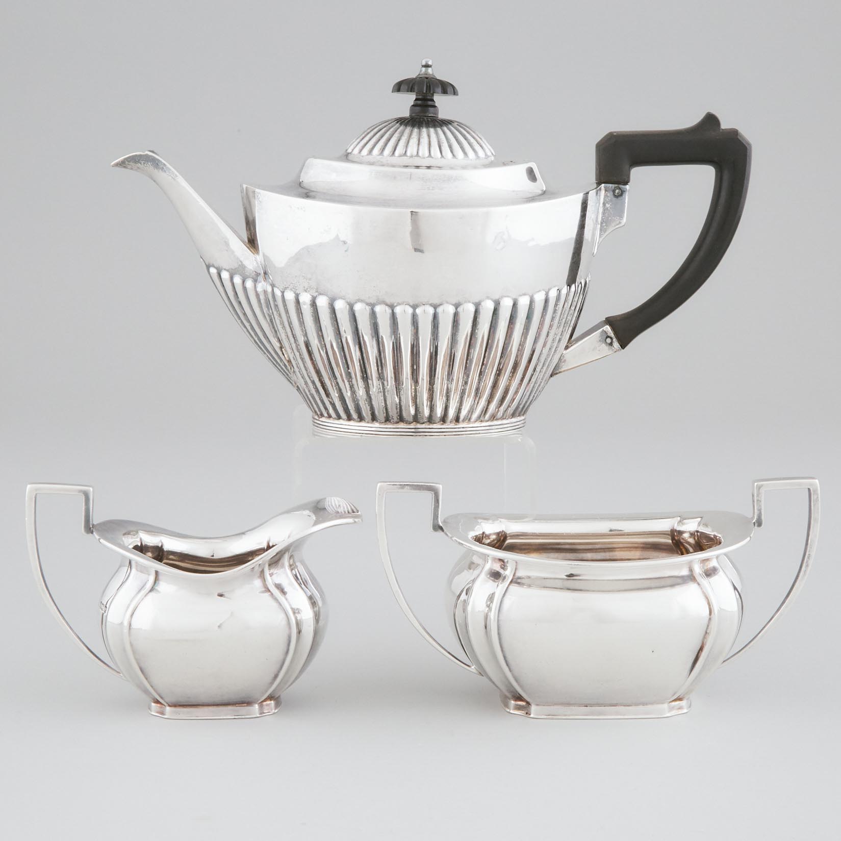 English Silver Teapot and a Cream Jug and Sugar Basin, Mappin & Webb and John Round & Son, Sheffield 1922