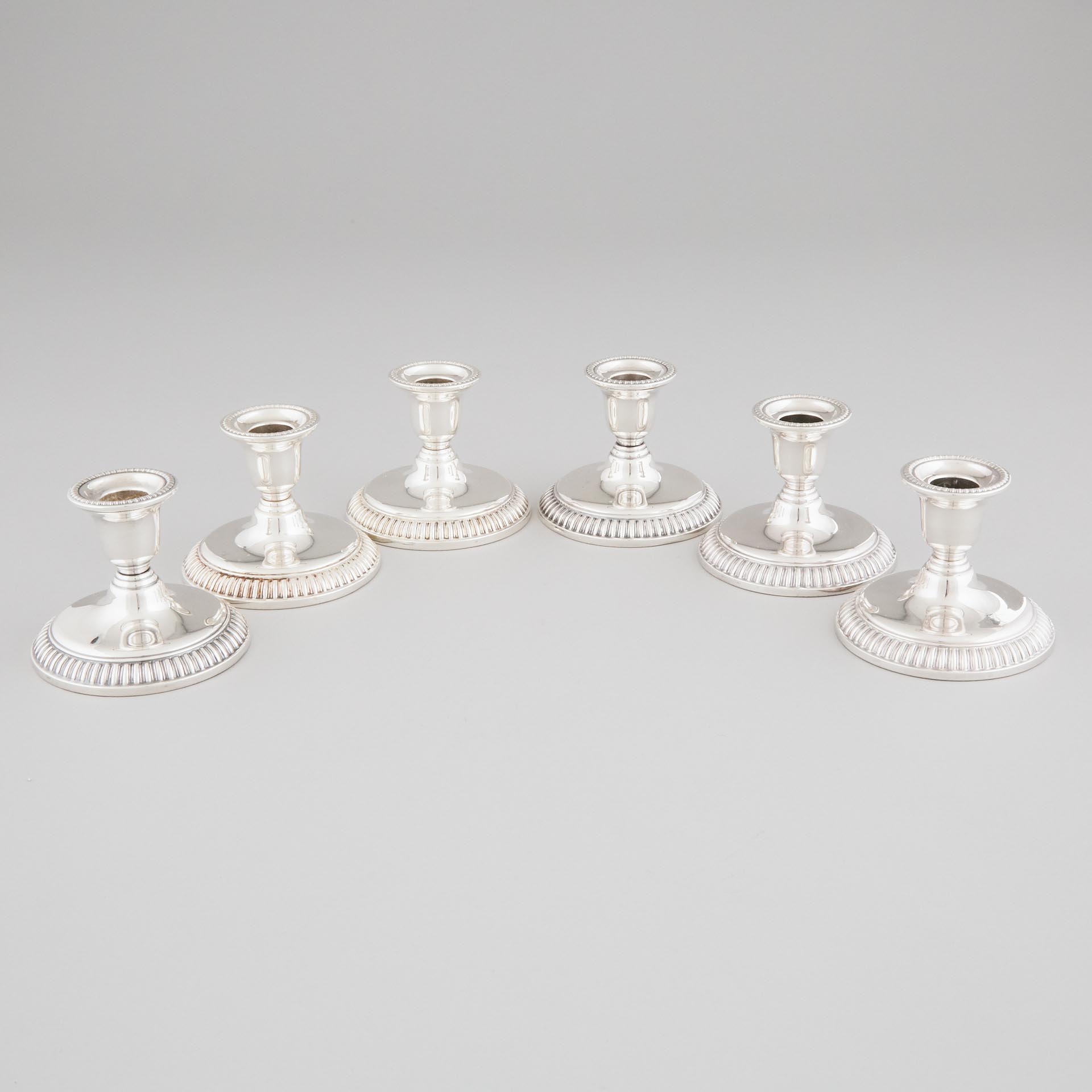 Six Canadian Silver Low Candlesticks, Henry Birks & Sons, Montreal, Que., 20th century