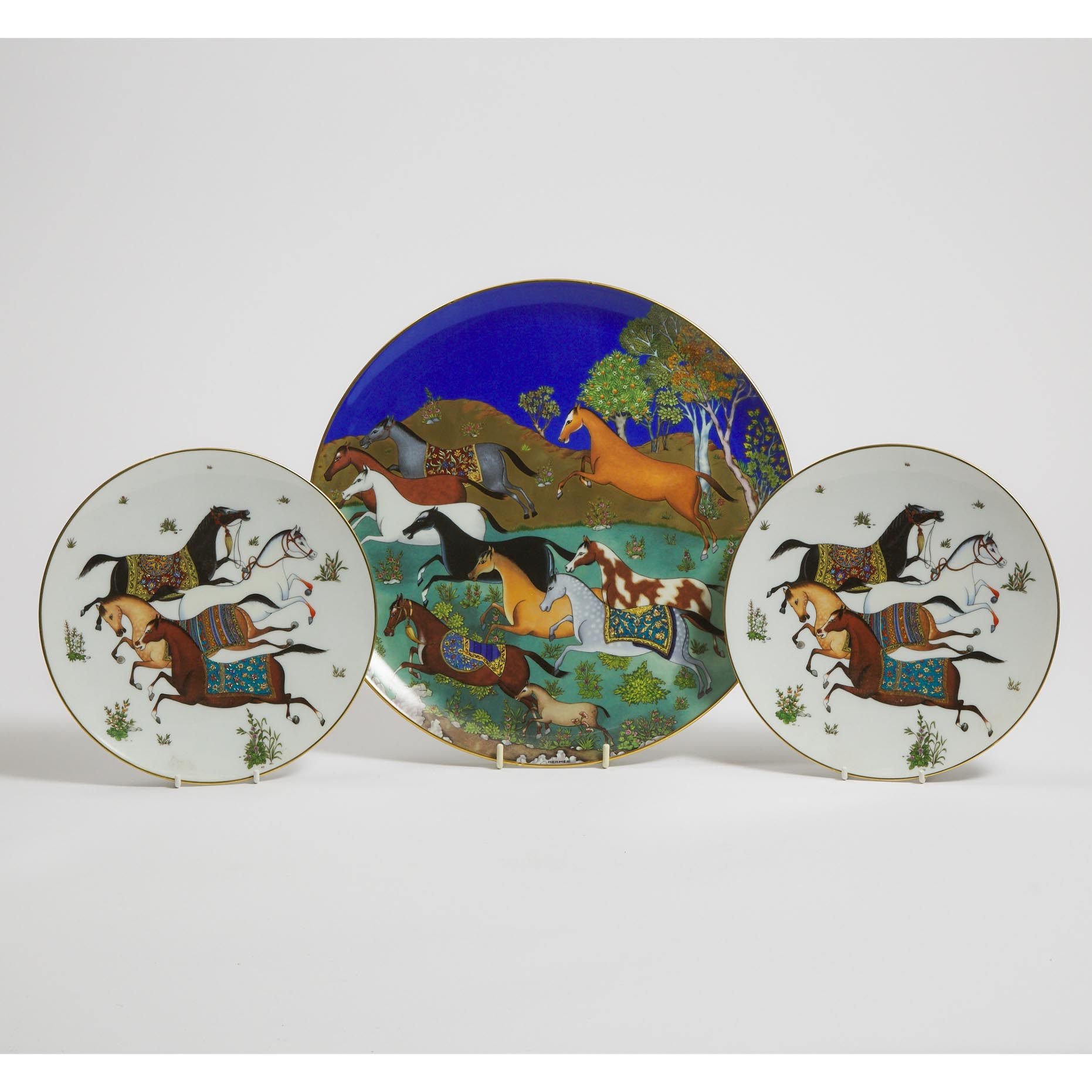 Hermès 'Cheval d'Orient' Charger and a Pair of Plates, early 21st century