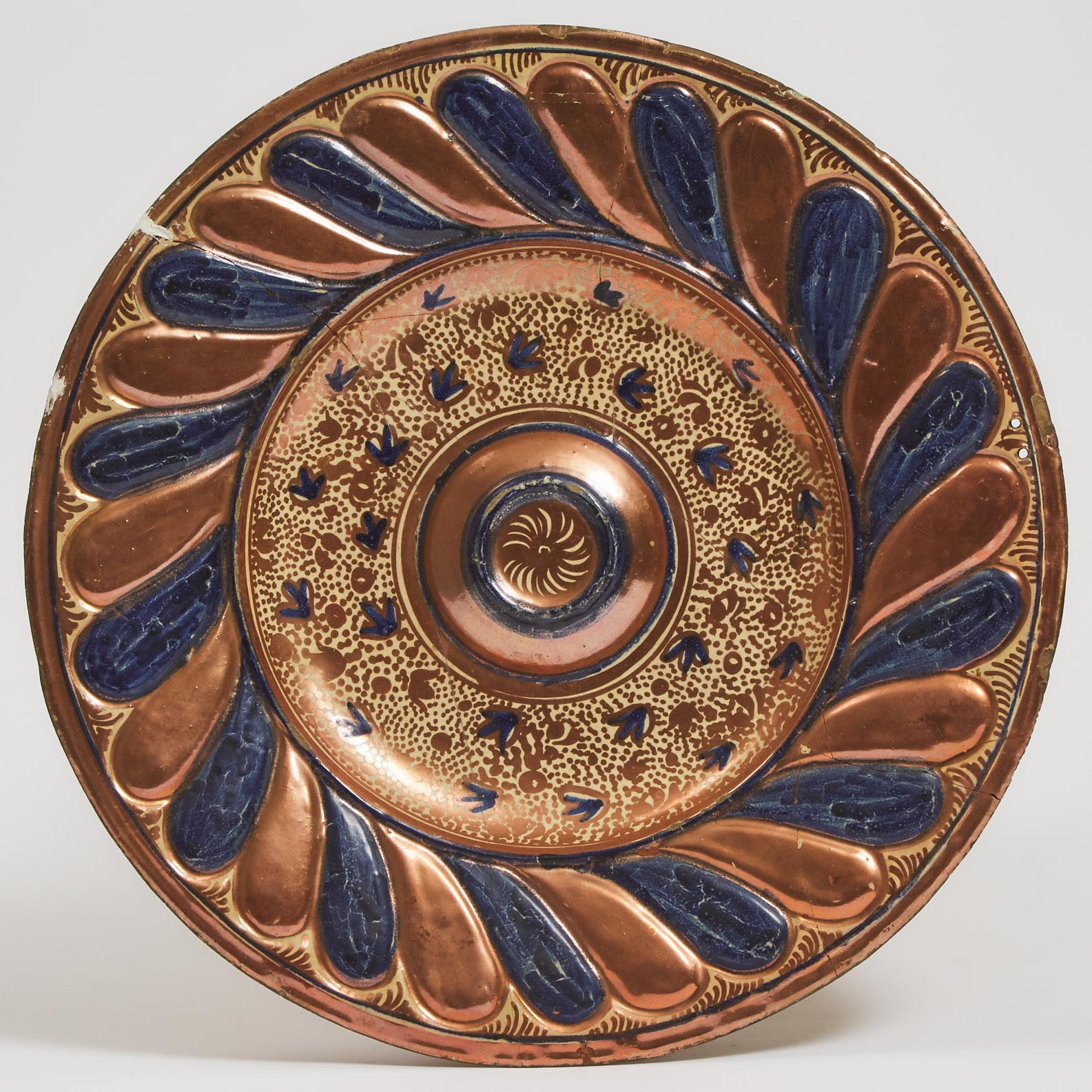 Hispano-Moresque Copper Lustre Decorated Earthenware Raised Boss Charger, 17th century or later