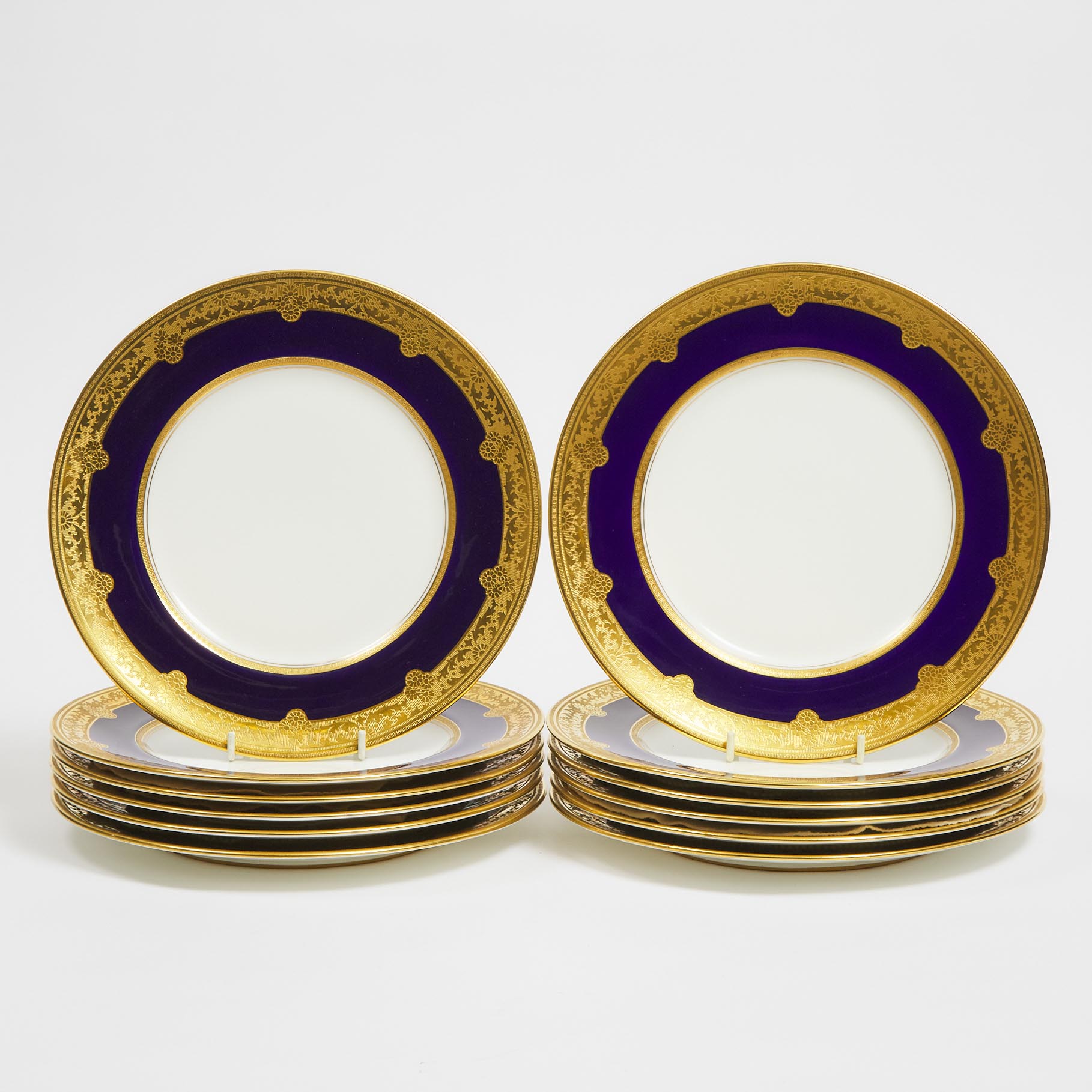 Set of Twelve Royal Doulton Blue and Gilt Bordered Service Plates, 1920s