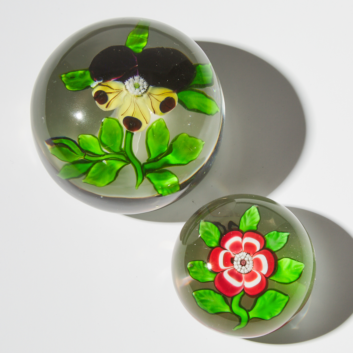 Baccarat Pansy and Miniature Red Primrose Glass Paperweights, mid-19th century
