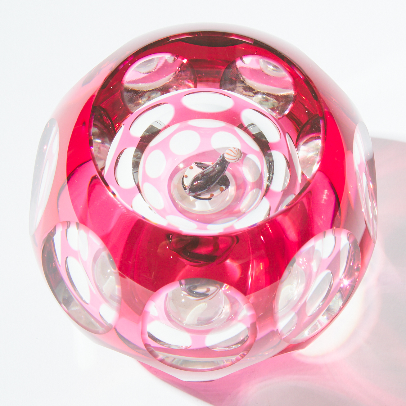 Perthshire Lampwork 'Seal and Ball' Faceted Glass Paperweight, 20th century