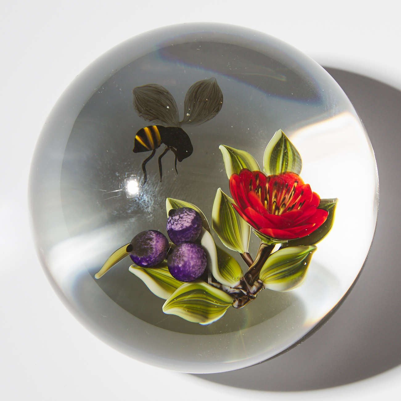 Victor Trabucco (American, b.1949), Bee, Fruit, and Flower Glass Paperweight, 2000