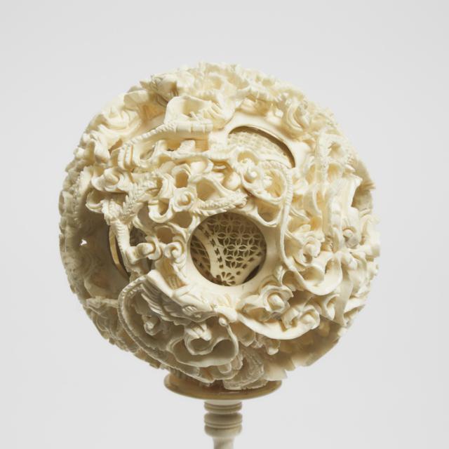 A Large Ivory Puzzle Ball and Stand, Circa 1900