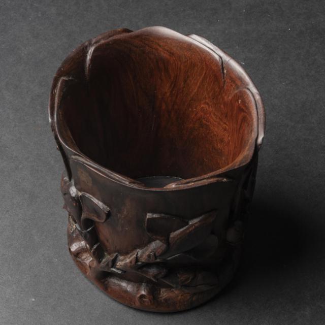 A Carved Huanghuali Orchid-Form Brush Pot, 19th/20th Century