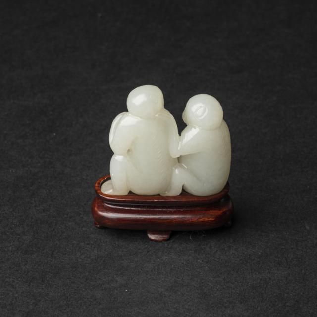 A White Jade 'Monkey' Group, 19th Century