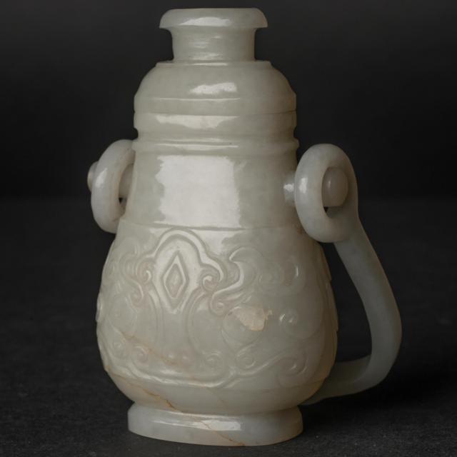 A White Jade 'Taotie' Hanging Vase, Ming Dynasty or Earlier