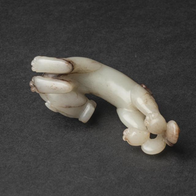 A White and Russet Jade 'Dragon' Group, 18th Century