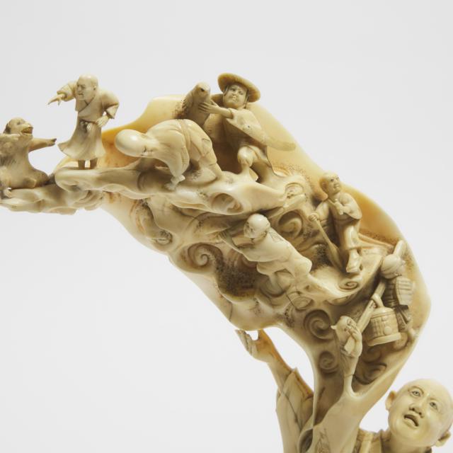 An Ivory Okimono Group of a Dream Sequence, Signed Dogetsu, Meiji Period (1868-1912)