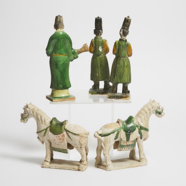 A Group of Five Sancai-Glazed Pottery Horses and Attendants, Ming Dynasty (1368-1644)