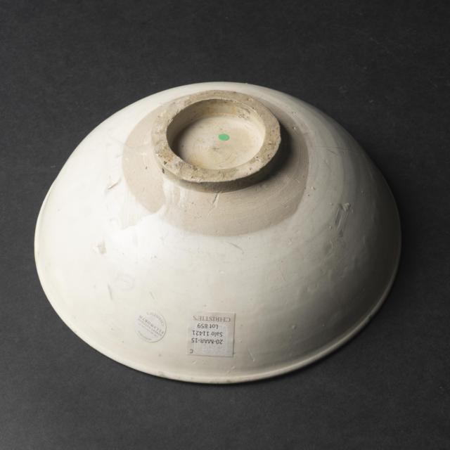 A Cizhou-Type White-Glazed Carved 'Floral' Bowl, Jin/Yuan Dynasty, 12th-14th Century