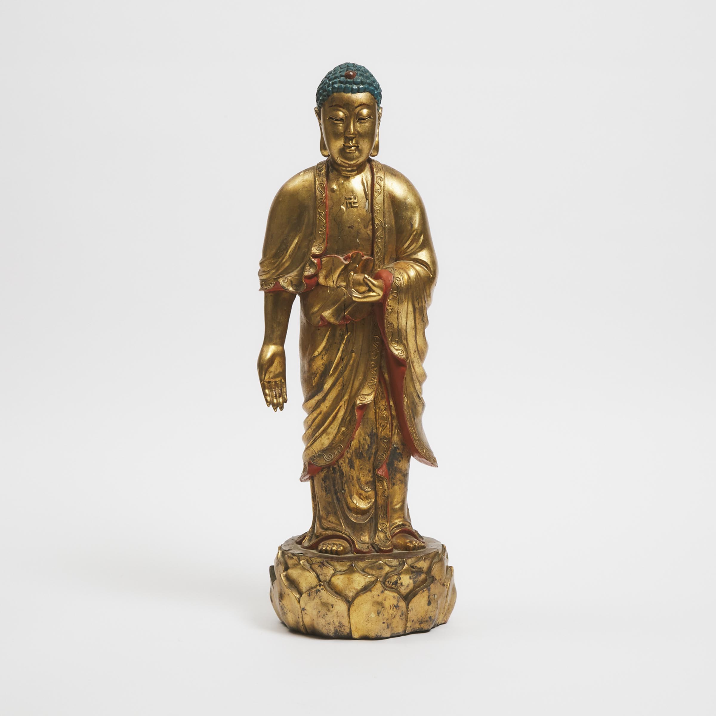 A Gilt Lacquered Wood Figure of Shakyamuni Buddha, Vietnam, 19th Century