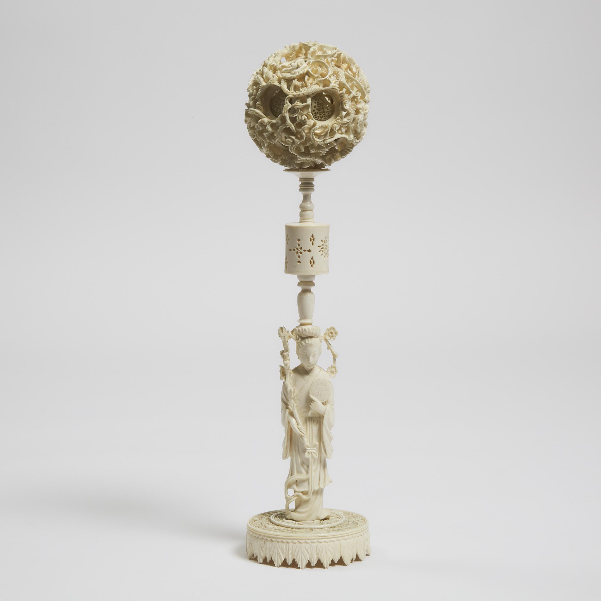 A Large Ivory Puzzle Ball and Stand, Circa 1900