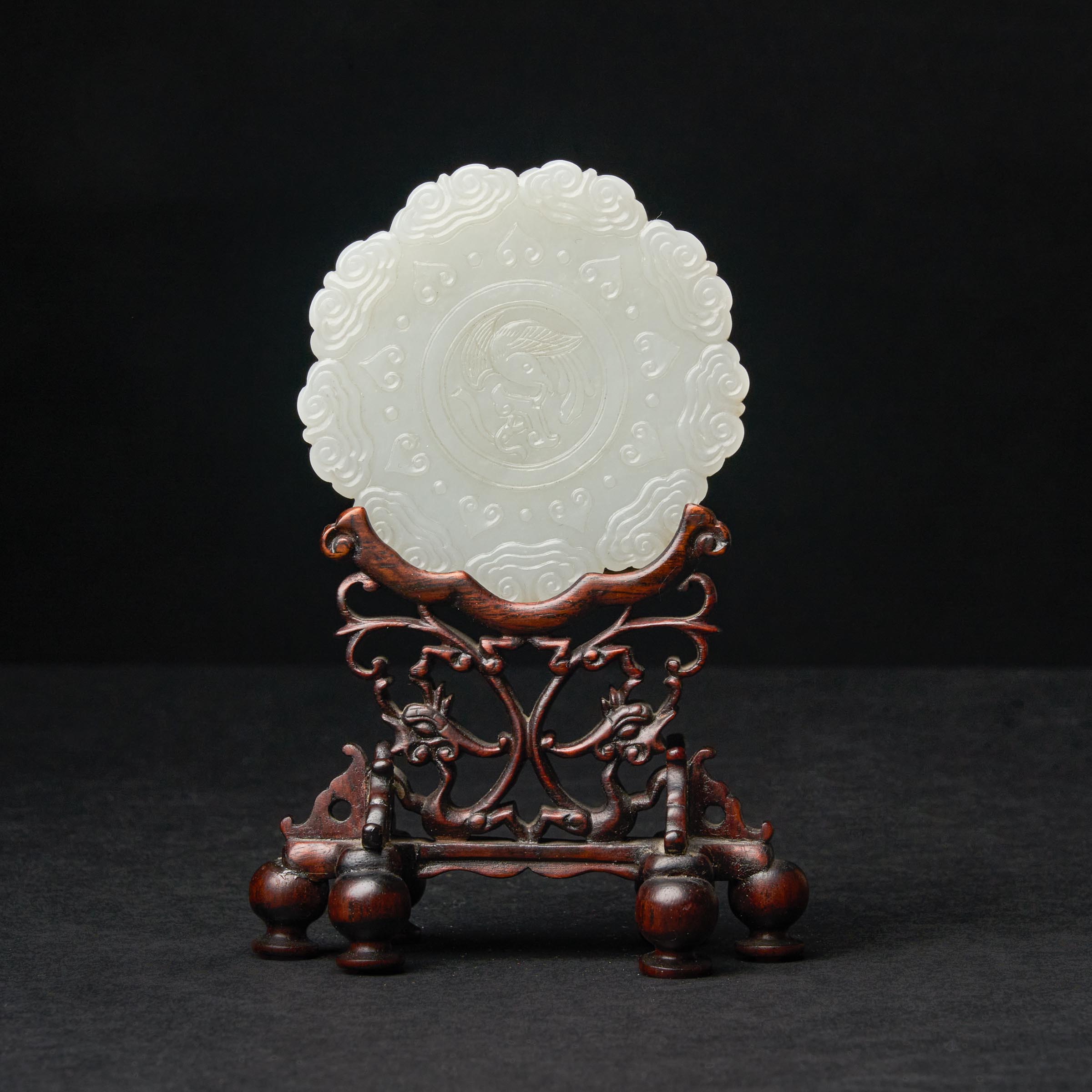 A White Jade 'Magpie' (Xi Qing) Pendant, Ming Dynasty (1368-1644)