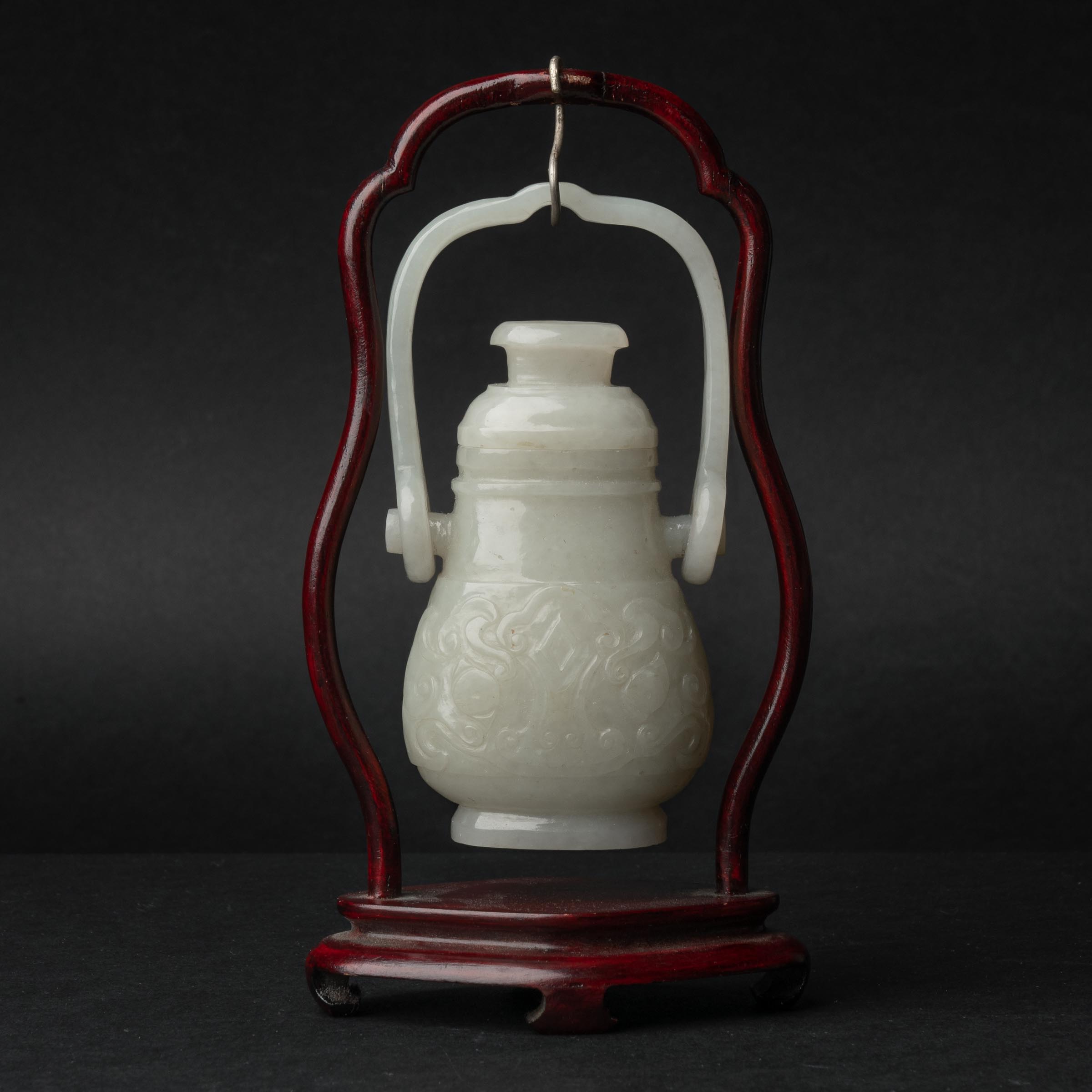 A White Jade 'Taotie' Hanging Vase, Ming Dynasty or Earlier