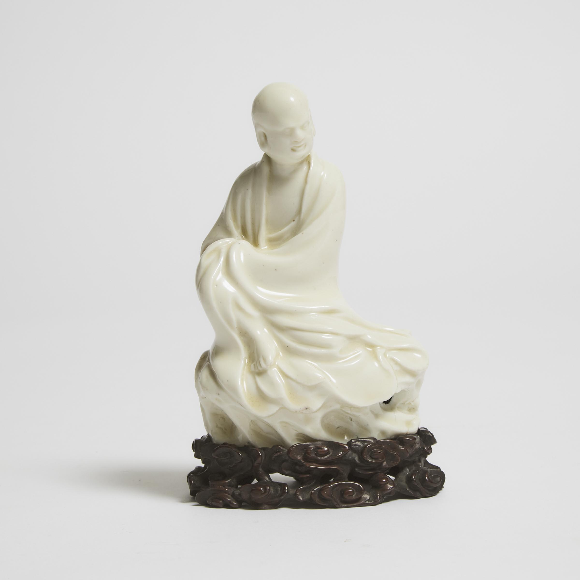 A Dehua Blanc de Chine Figure of Damo (Bodhidharma), Late Ming Dynasty