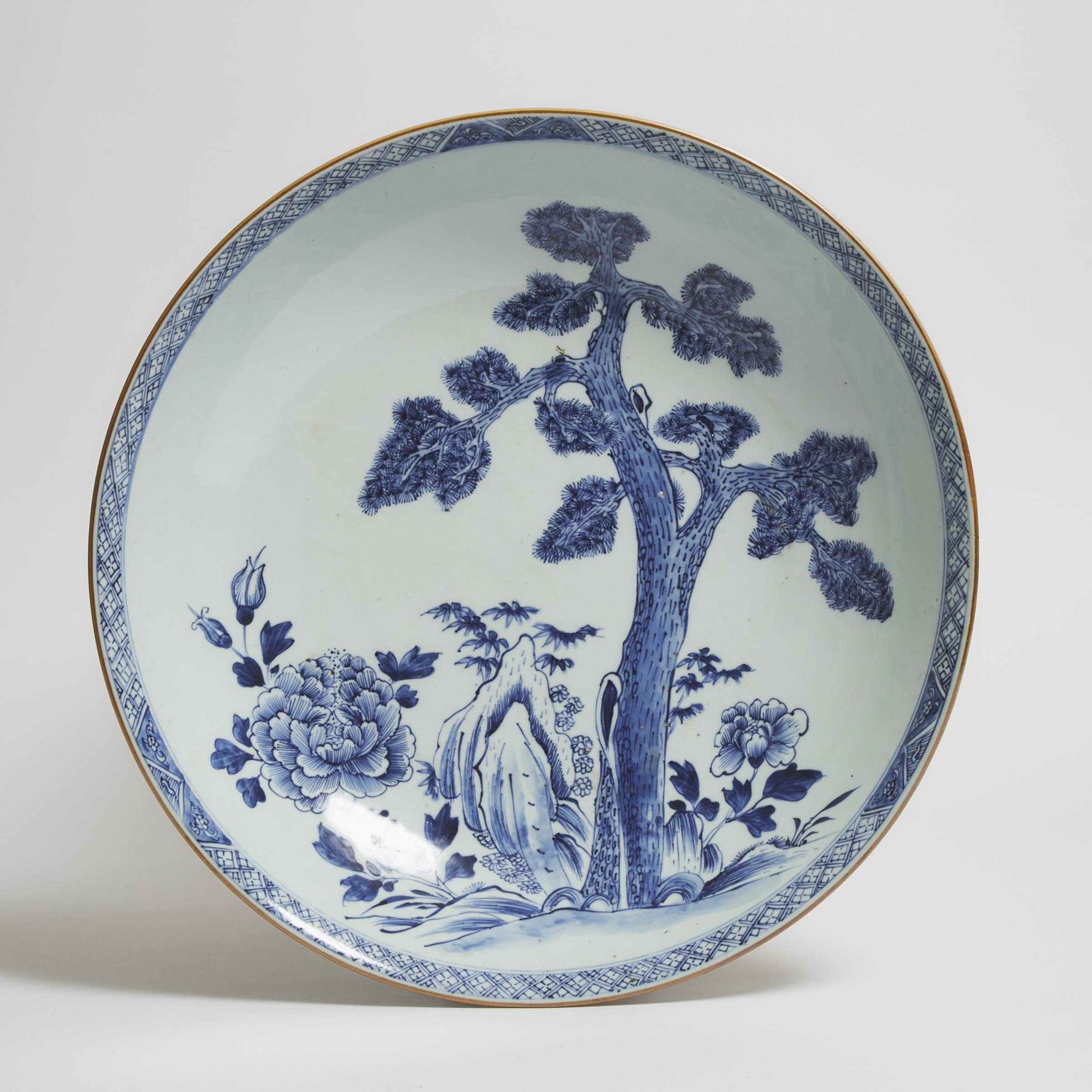 A Large Blue and White 'Pine and Flowers' Plate, 18th Century