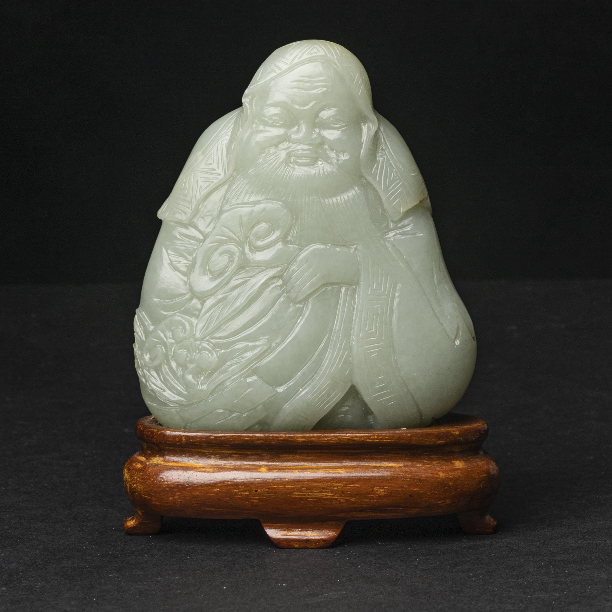 A Pale Celadon Jade Figure of the Daoist Immortal Laozi, 18th/19th Century
