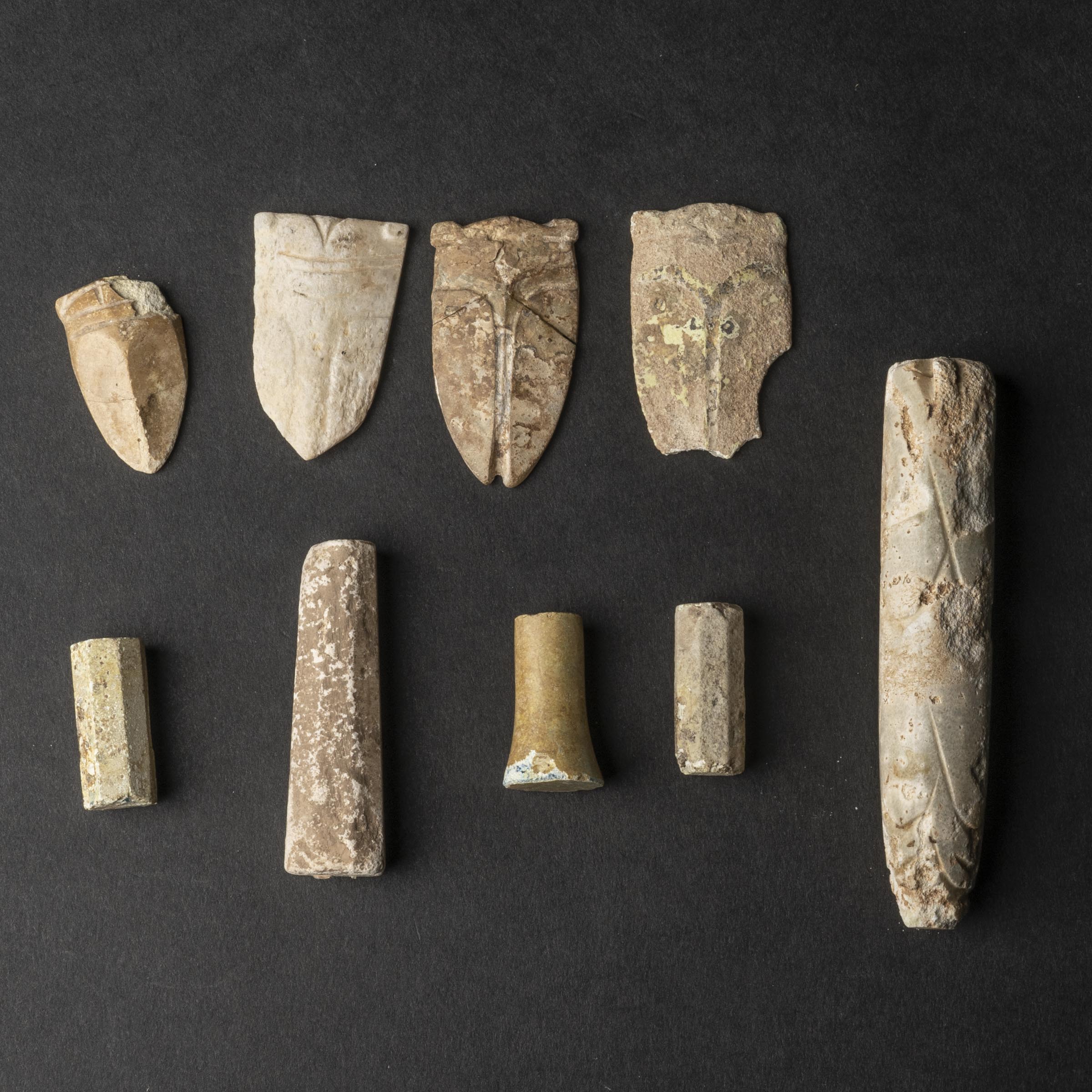 A Group of Nine Archaic Glass Burial Ornaments, Han Dynasty (206 BC-AD 220)