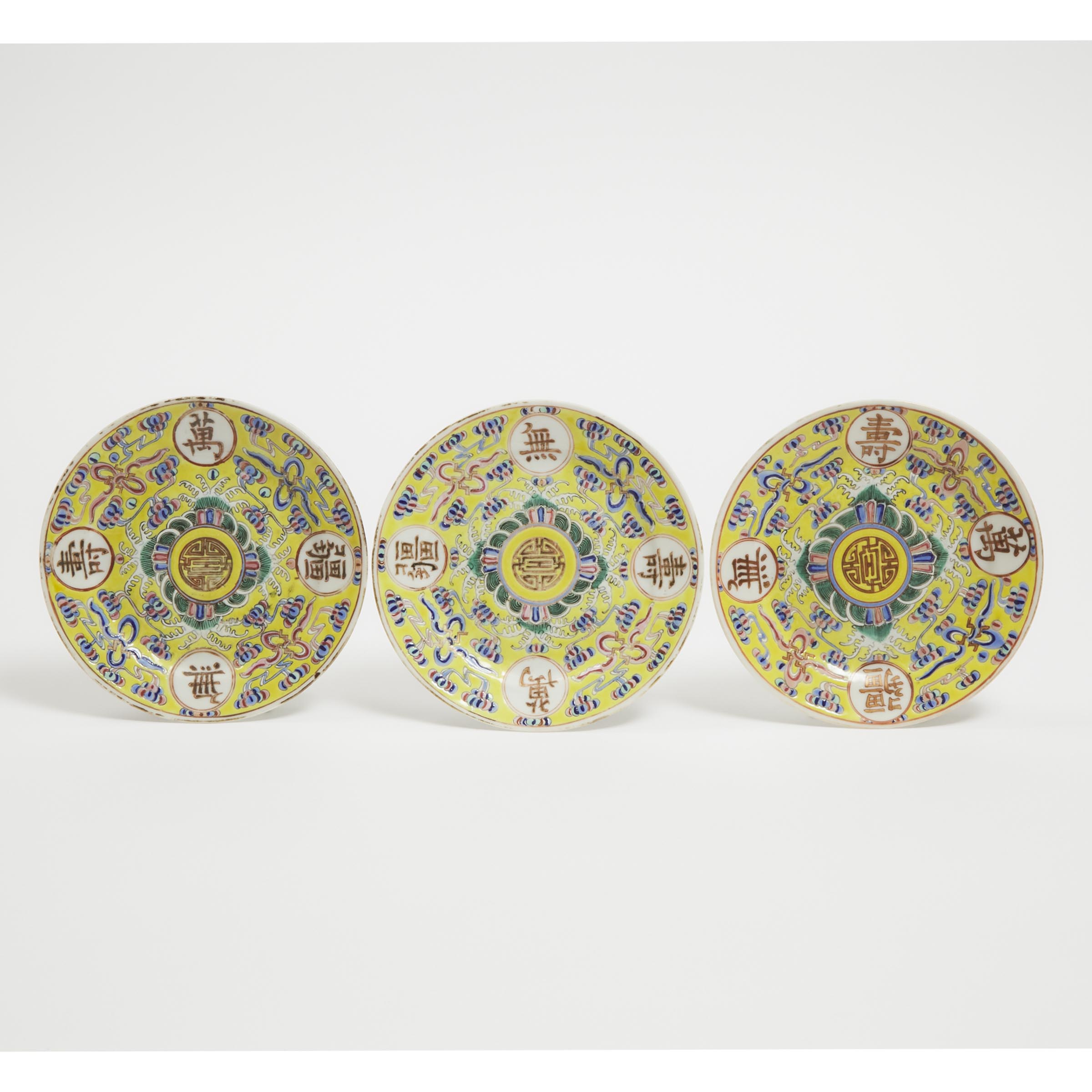 Three Famille Rose and Gilt-Decorated Yellow-Ground 'Longevity' Plates, Guangxu Mark, Early 20th Century