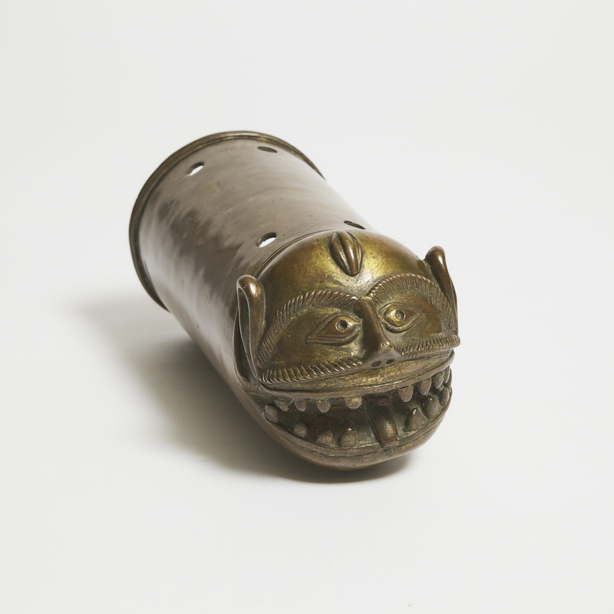 A Gilt Bronze Palanquin Finial in the Form of a Makara Head, India, 18th Century