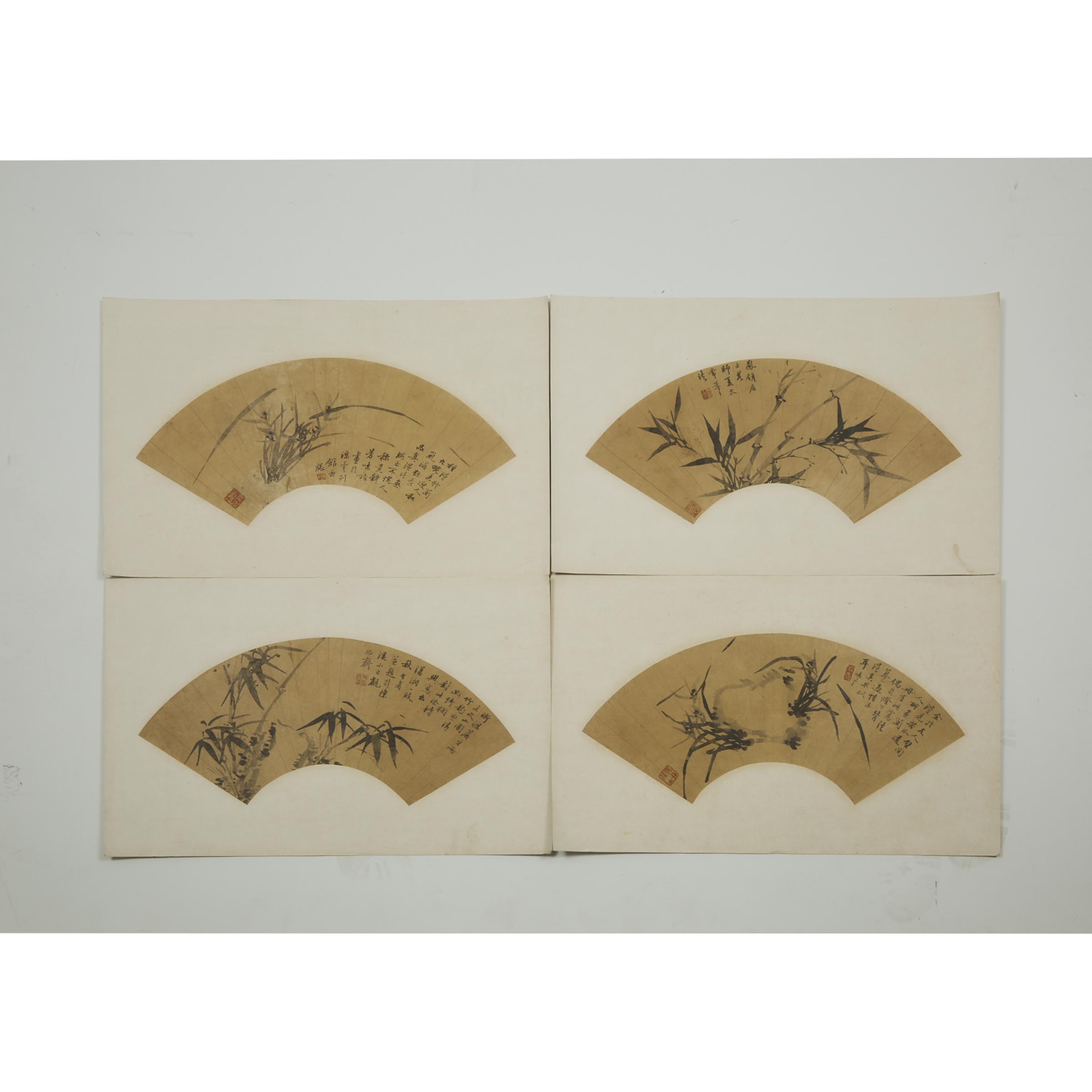 A Group of Four Fan Paintings of Orchids, Bamboo and Calligraphy, Late Qing Dynasty