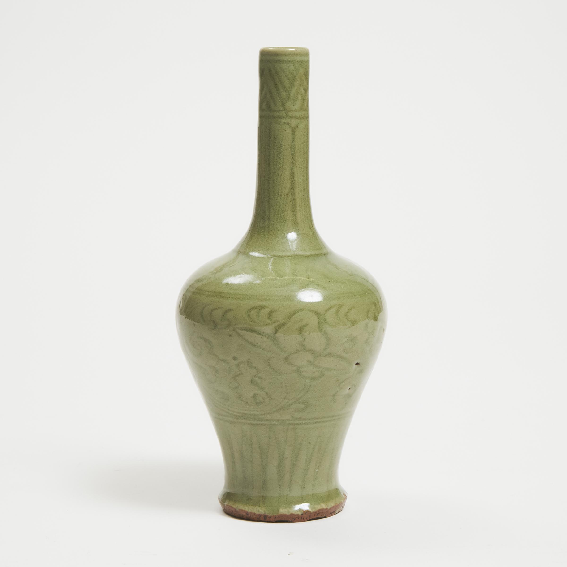 A Carved Yaozhou-Glazed Celadon Bottle Vase, Ming Dynasty (1368-1644)