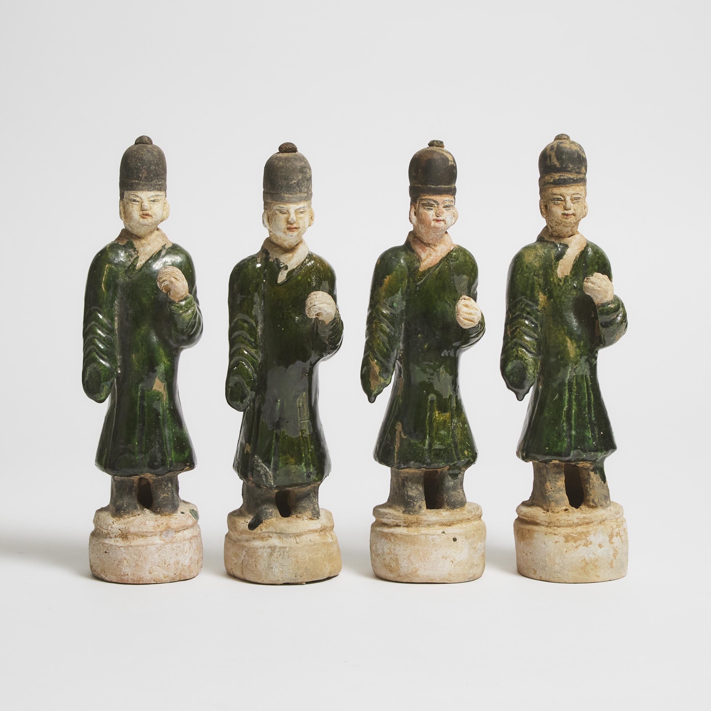 A Group of Four Green-Glazed Pottery Figures, Ming Dynasty (1368-1644)