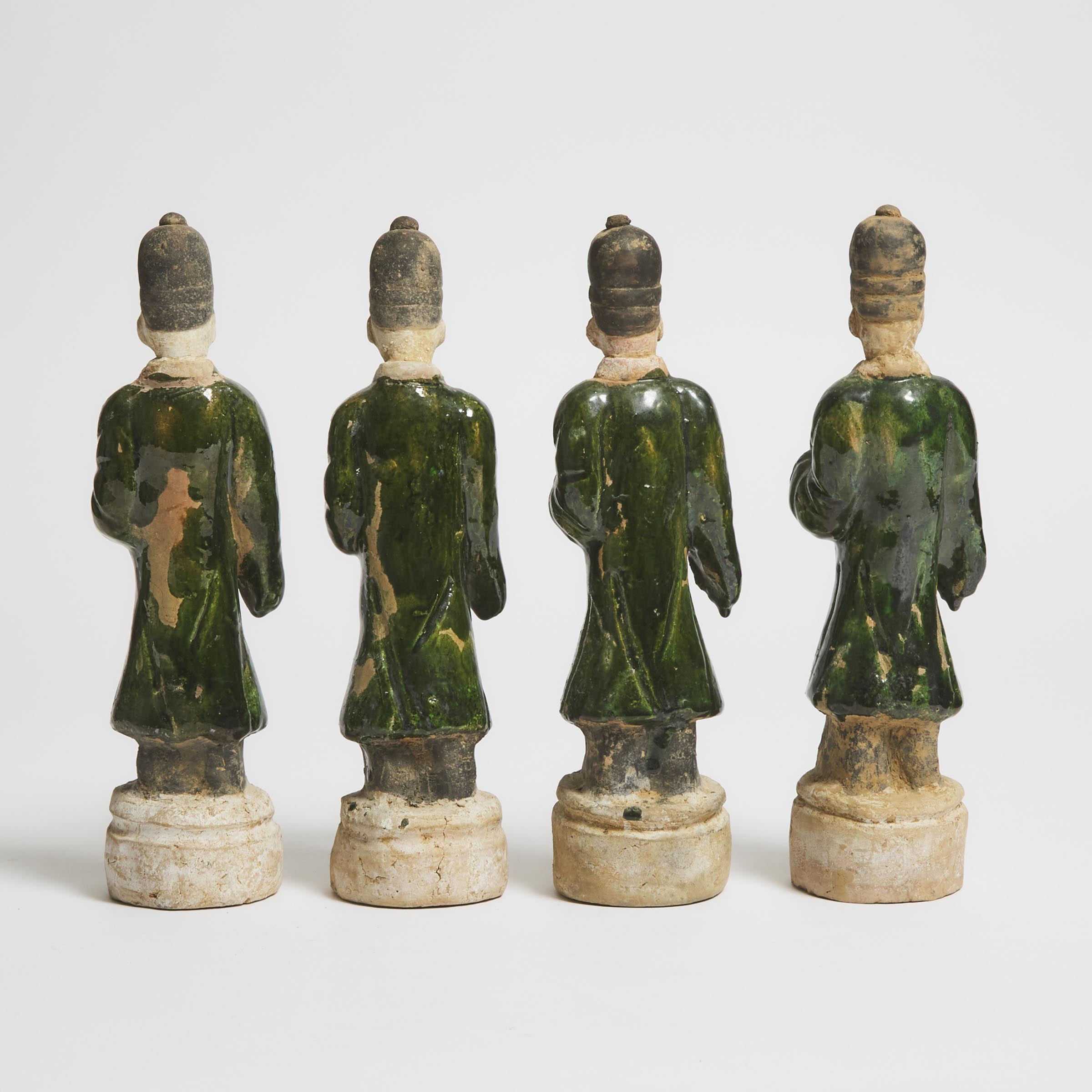 A Group of Four Green-Glazed Pottery Figures, Ming Dynasty (1368-1644)