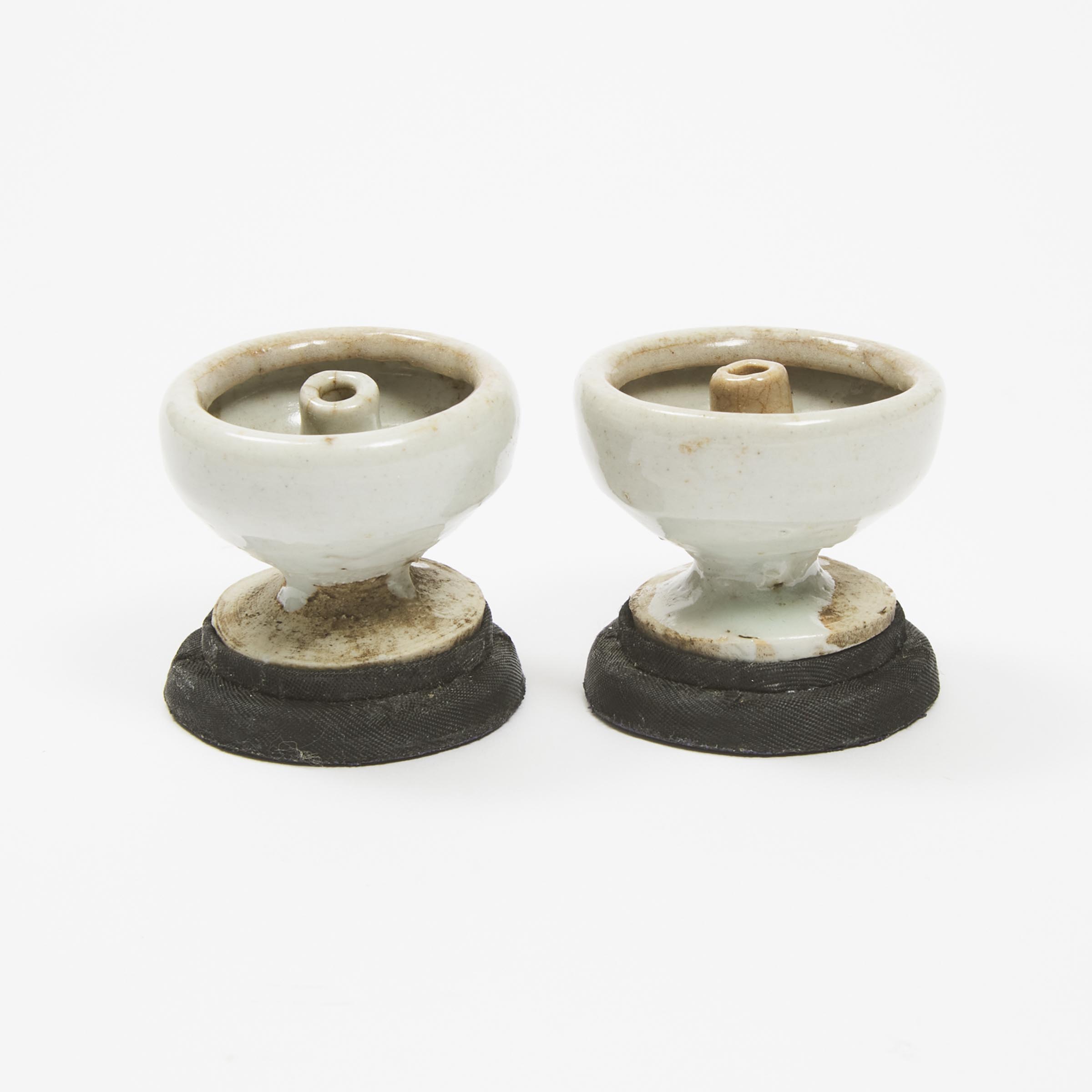 A Pair of Small White-Glazed Oil Lamp Stands, Song Dynasty (960-1279)