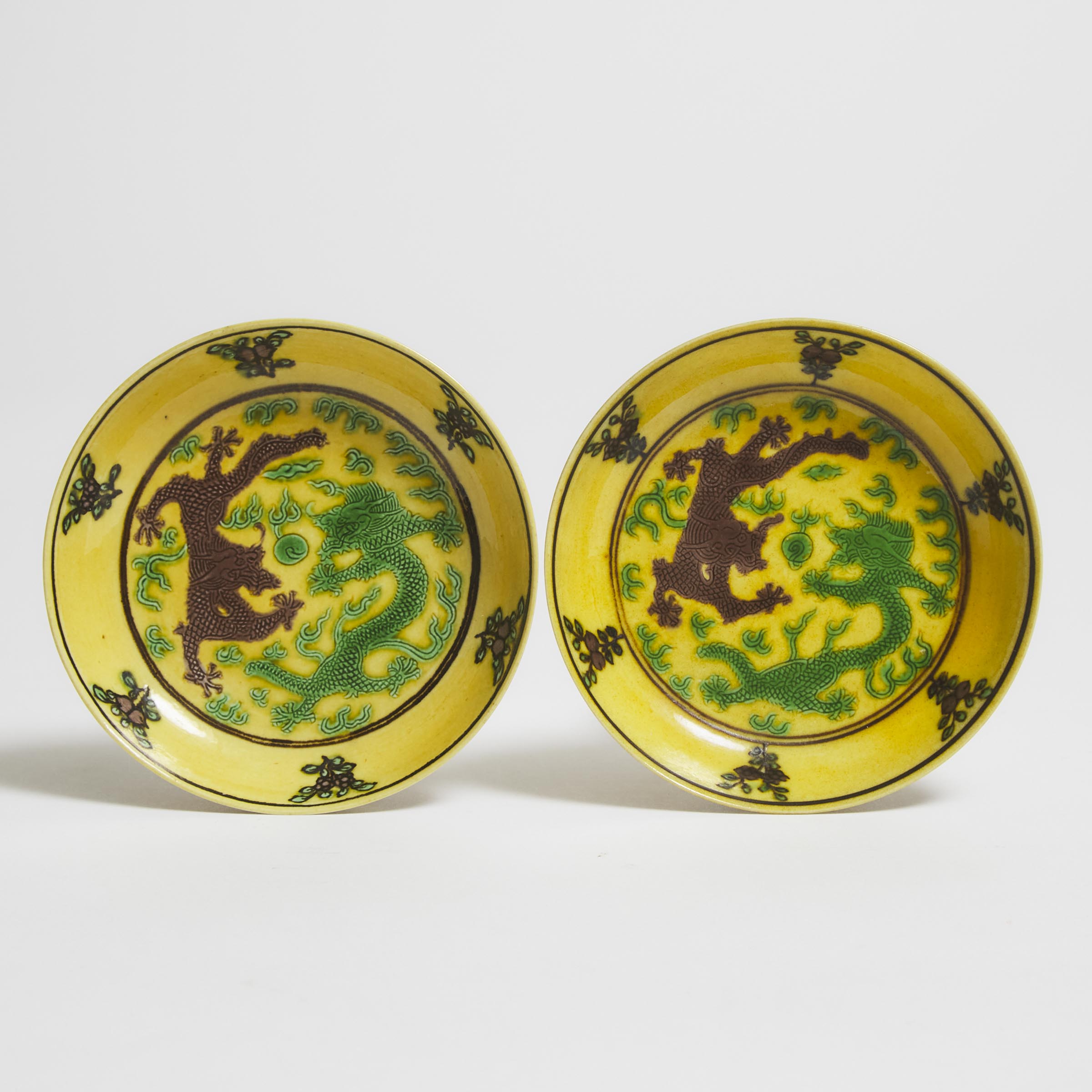 A Pair of Green and Aubergine Enameled 'Dragon' Dishes, Guangxu Mark and Period (1875-1908)