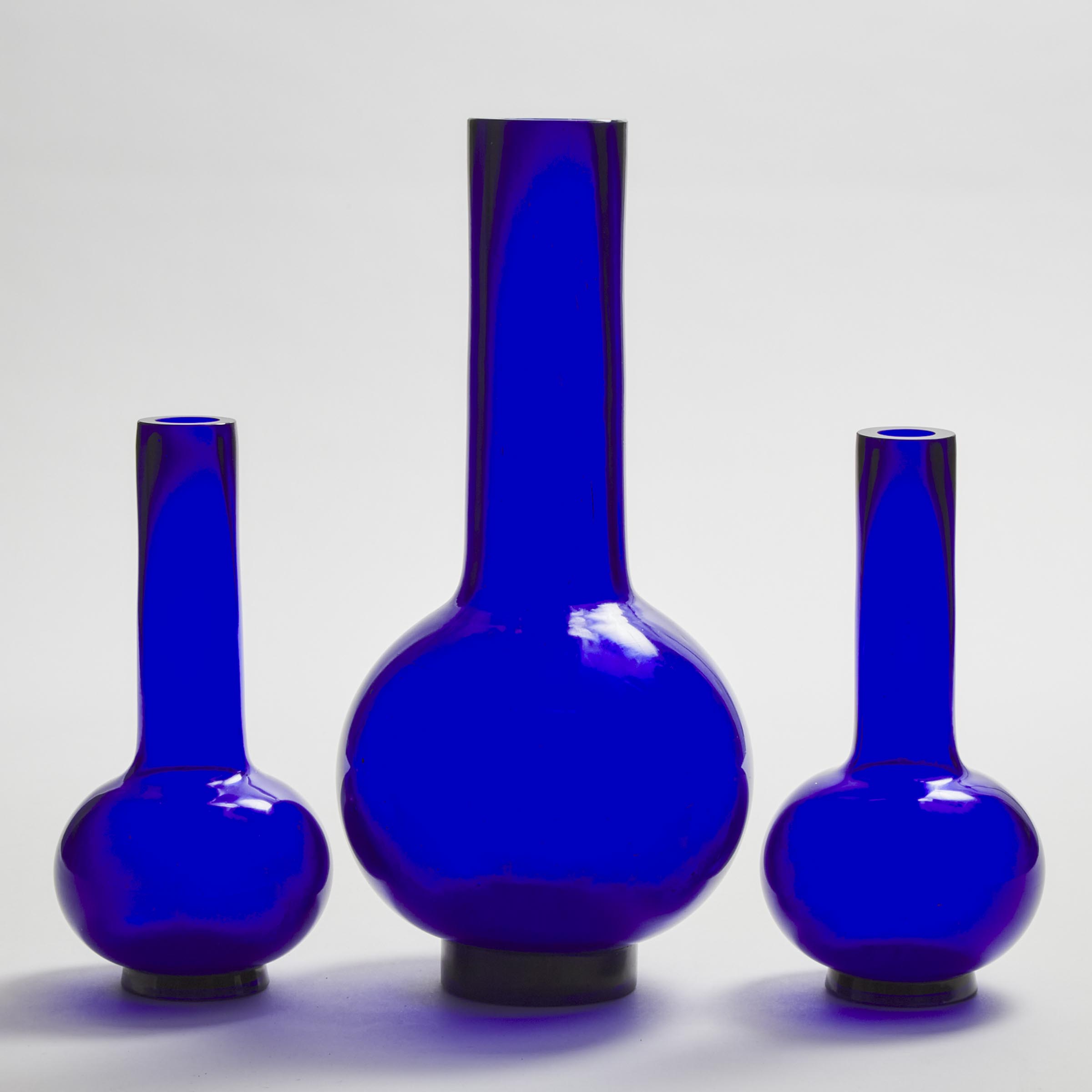 A Group of Three Blue Peking Glass Bottle Vases, Early 20th Century