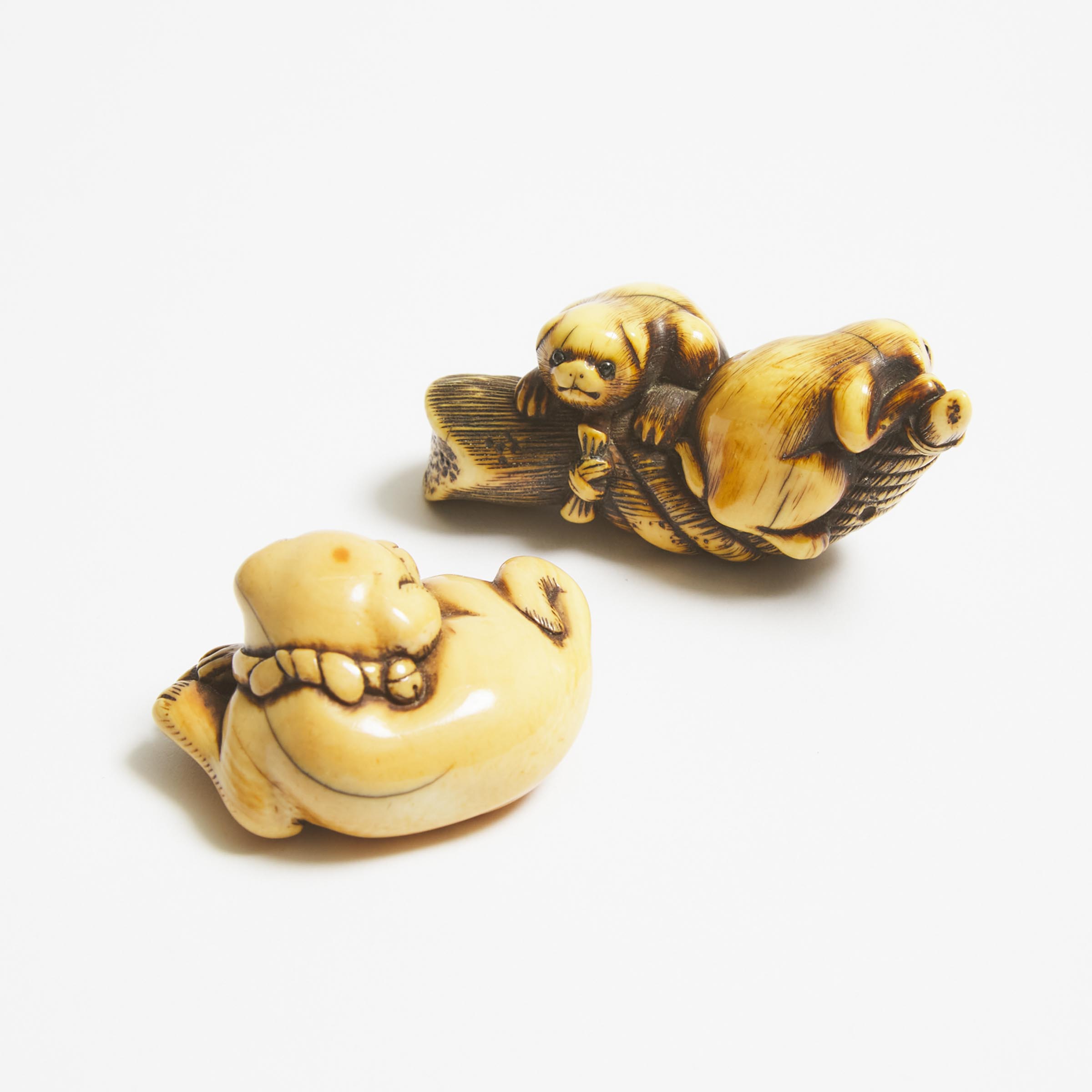 Two Ivory Netsuke of Puppies, Early to Mid 19th Century