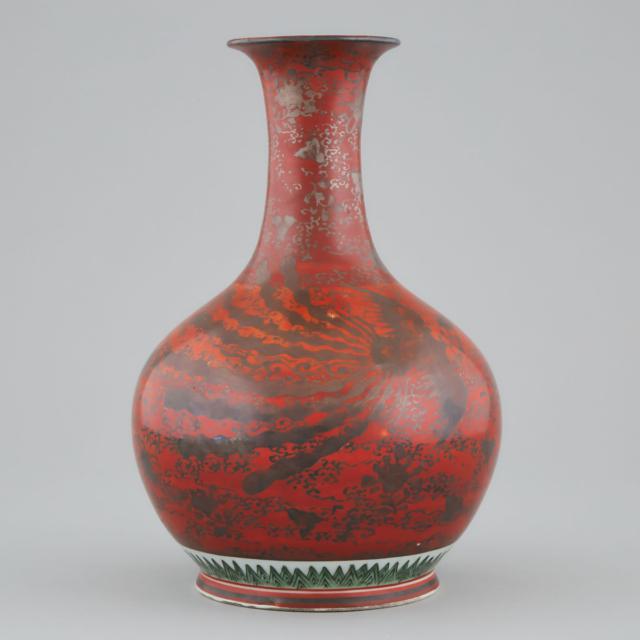 A Kutani Silver-Decorated Iron-Red Ground 'Phoenix' Bottle Vase, Eiraku Mark, Early 19th Century